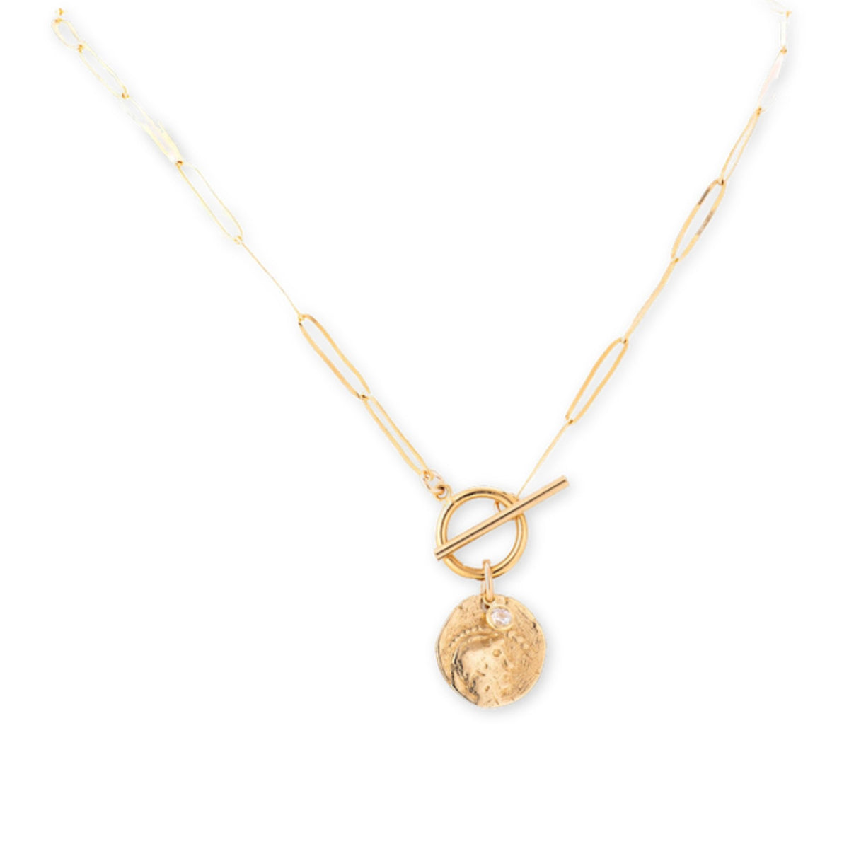 Gold paperclip chain necklace with a toggle clasp and a round textured gold coin pendant with a small stone