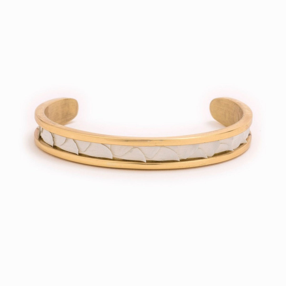 Small Taylor & Tessier cuff bracelet, .5in wide, front view, white python-embossed leather on a gold band