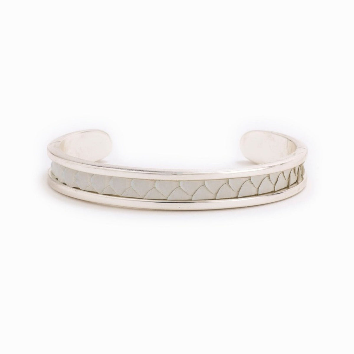 Small Taylor & Tessier cuff bracelet, .5in wide, front view, white python-embossed leather on a silver band