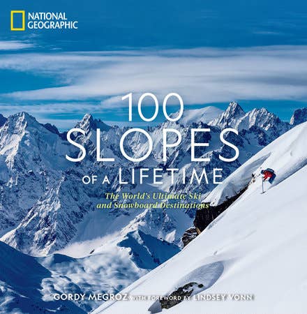 Book cover of '100 Slopes of a Lifetime' with a skier on a mountain, National Geographic logo.