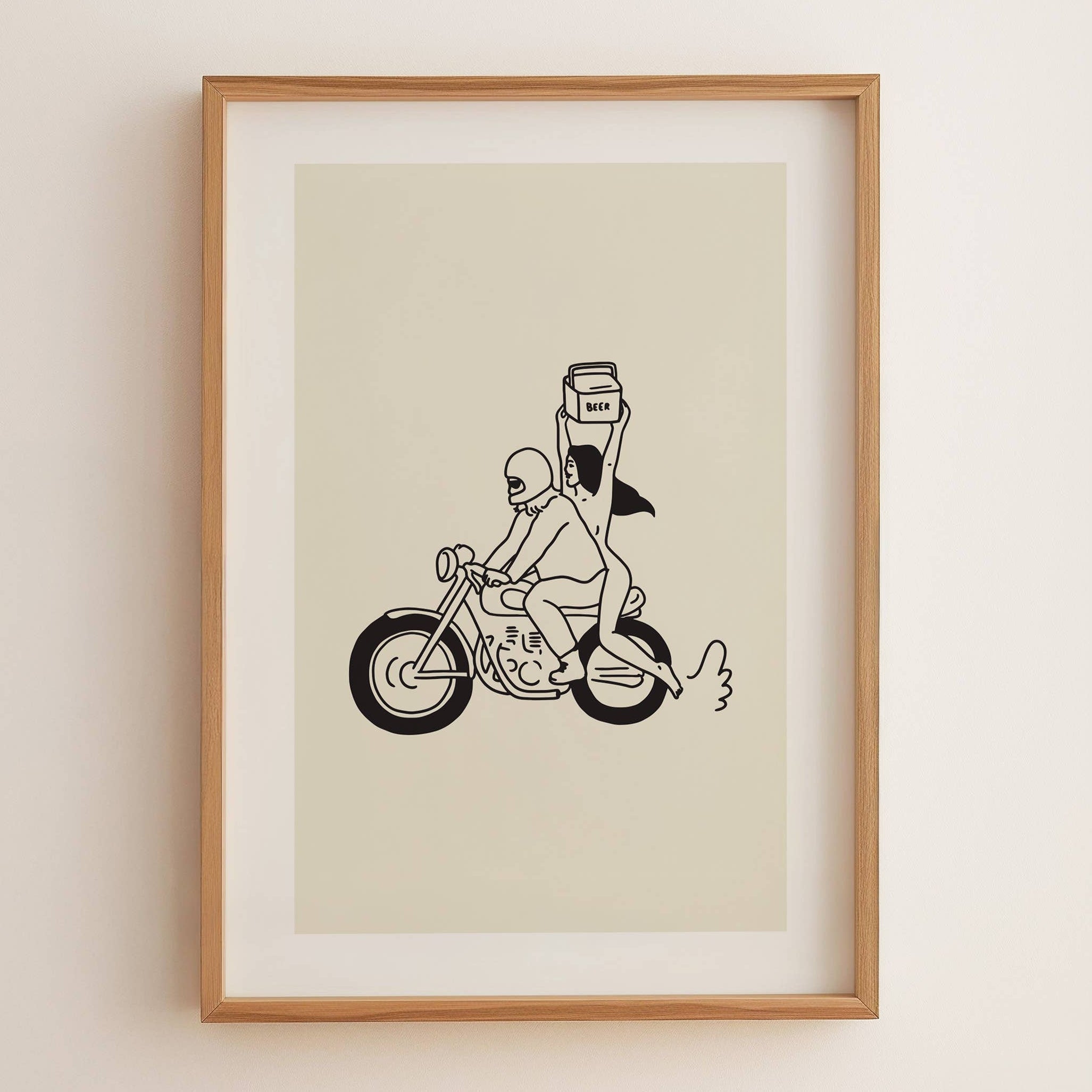 Framed illustration of a person on a motorcycle with a box, on a beige wall.