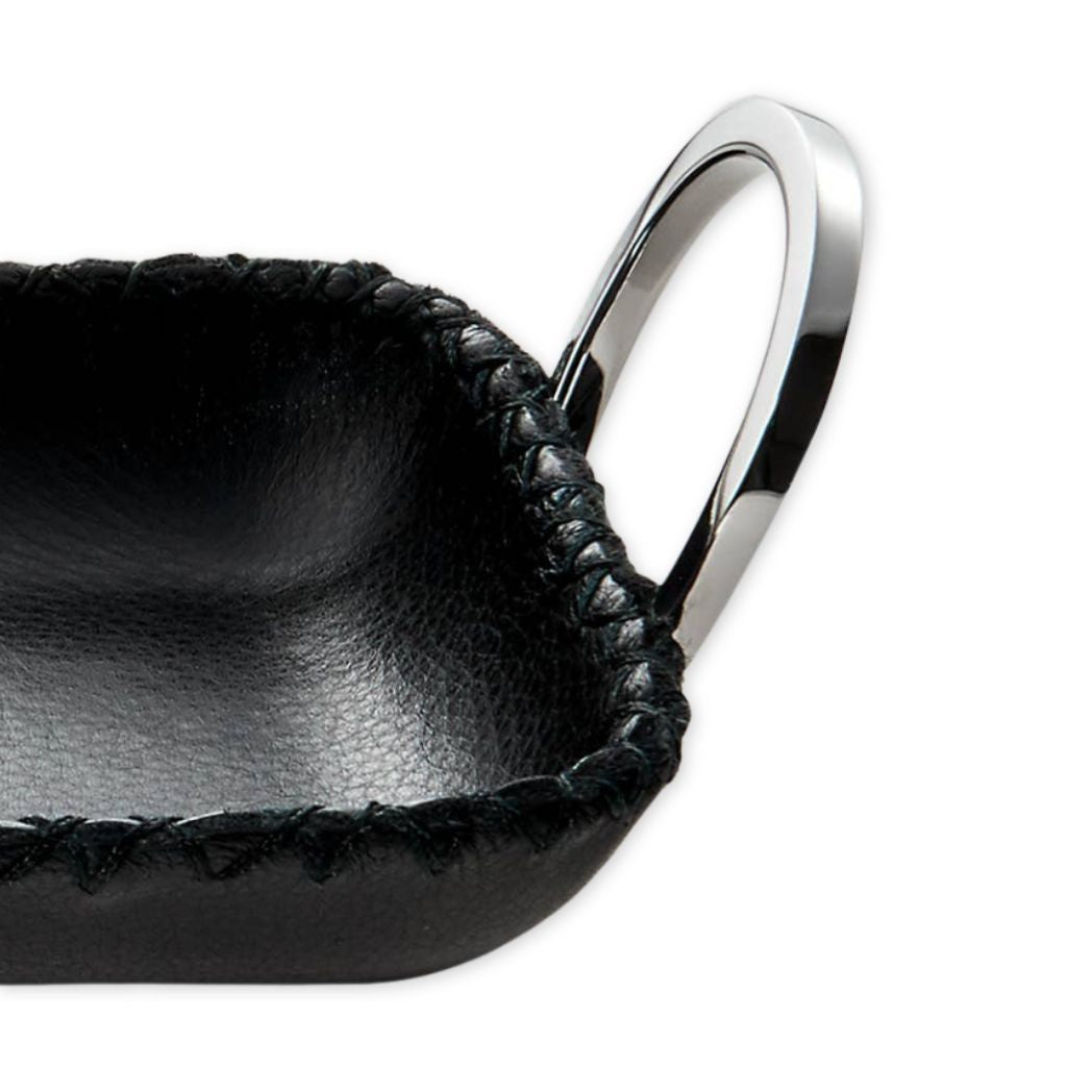 Black leather key case with a silver key ring on a white background
