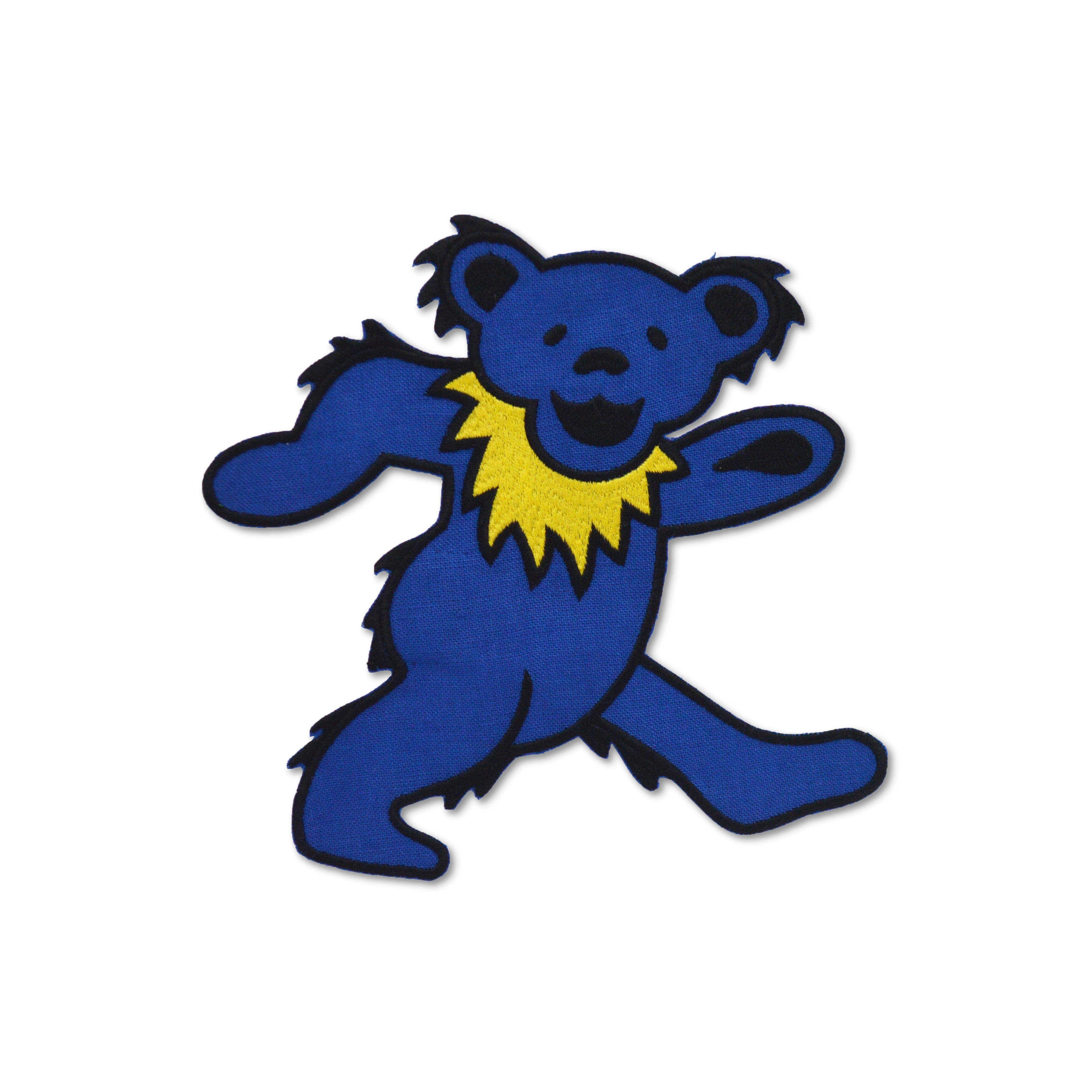 Blue bear with a yellow neckerchief on a white background