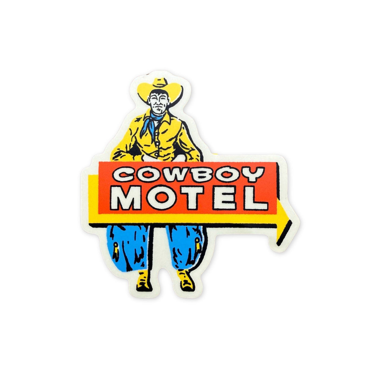A die-cut sticker featuring a retro cowboy illustration and the words 'COWBOY MOTEL' in bold white letters on an orange-red background, placed on a brown wood surface.