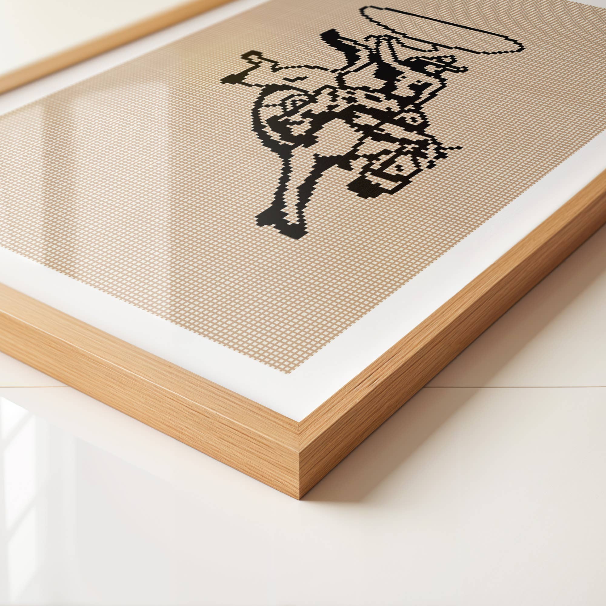 Framed artwork with a black silhouette of a person on beige fabric background