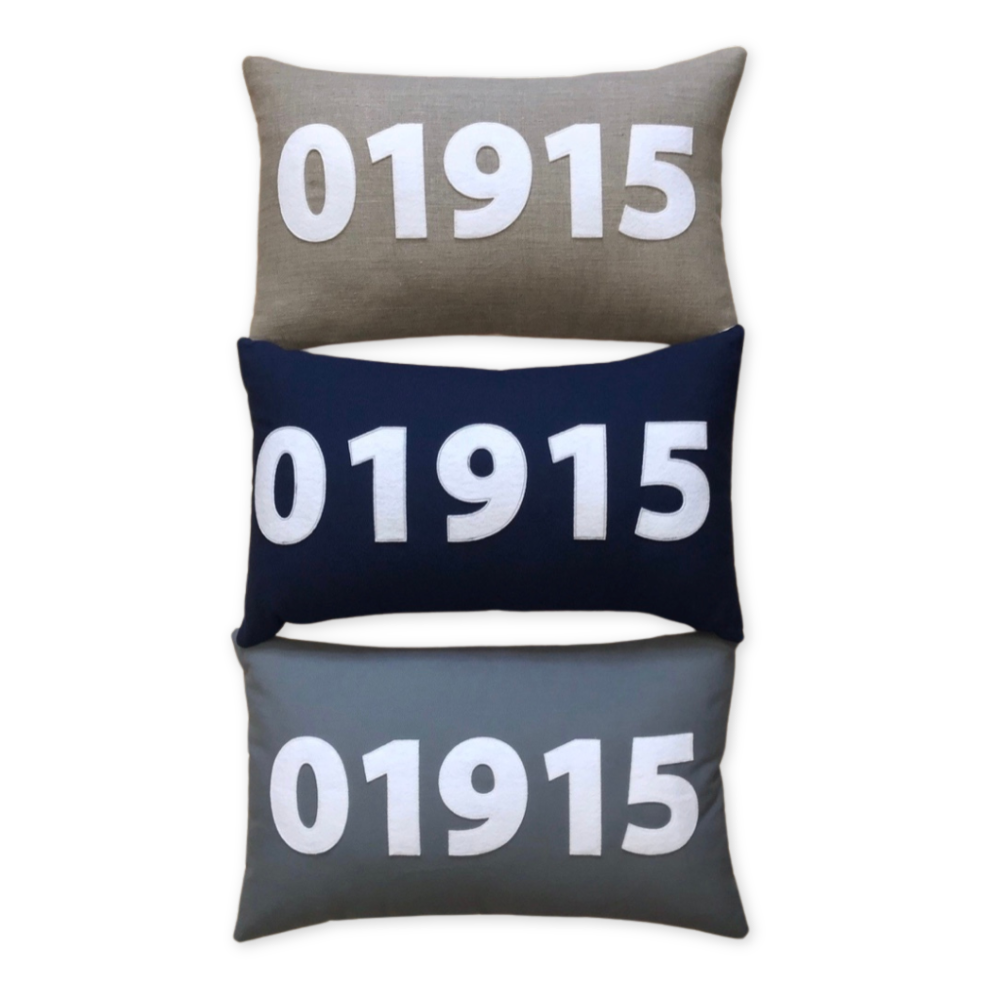 lumbar pillow featuring a stitched custom zip code