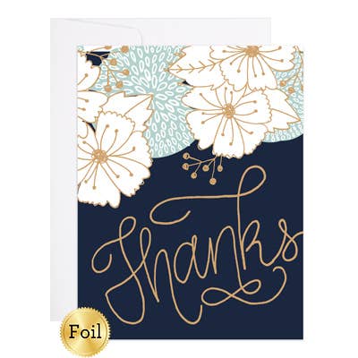 Greeting card with floral design and 'Thanks' text on a blue background
