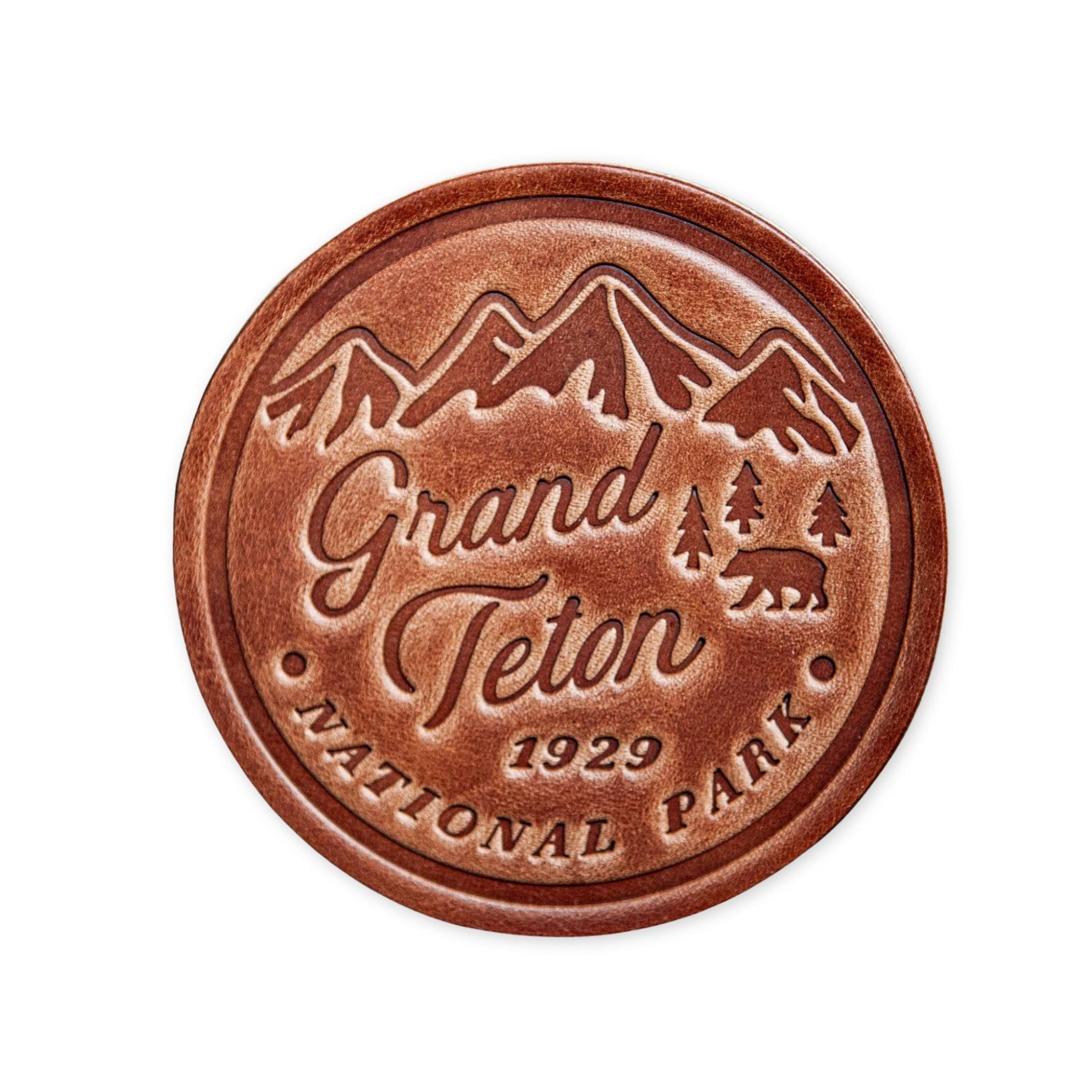 Brown leather patch with Grand Teton National Park design on a white background