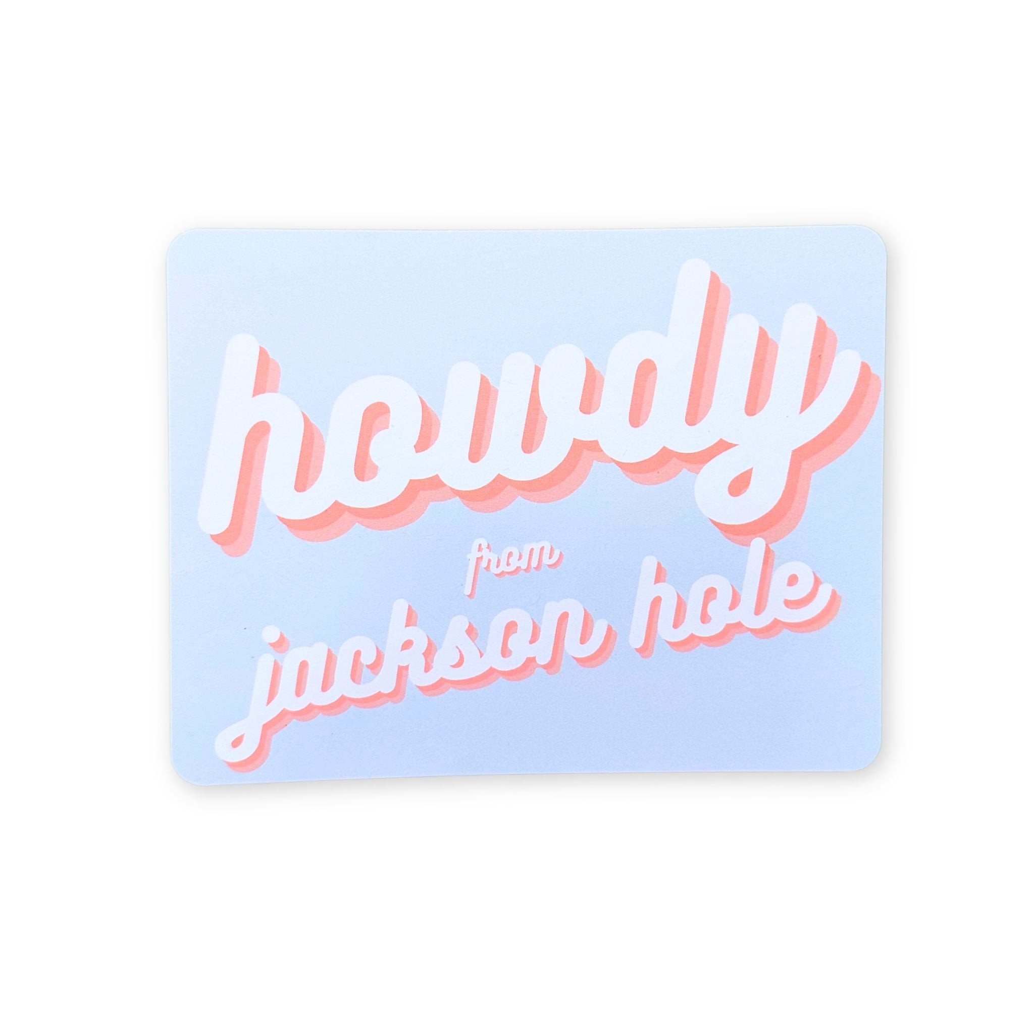 Card with 'howdy from jackson hole' text on a light blue background