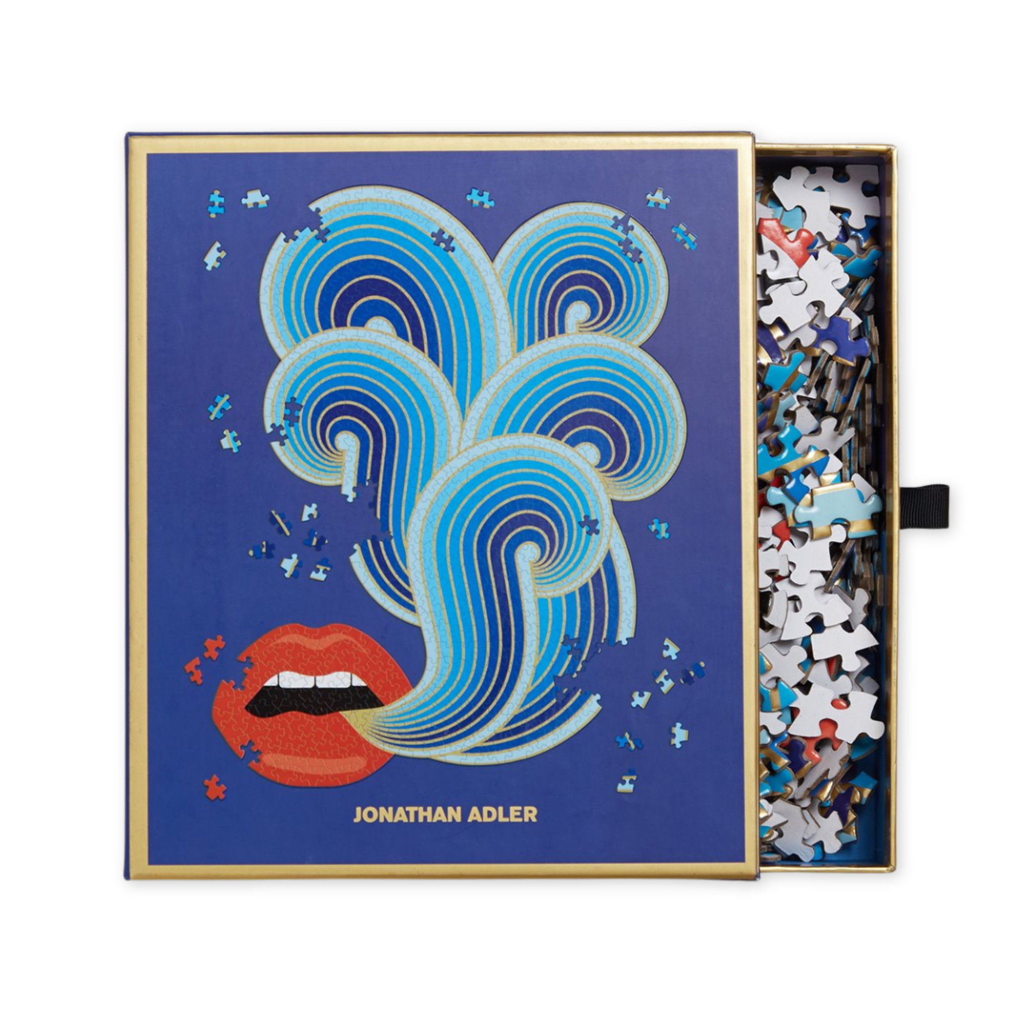 seven hundred fifty piece puzzle by the artist johnathan adler in the shape of a mouth blowing a kiss