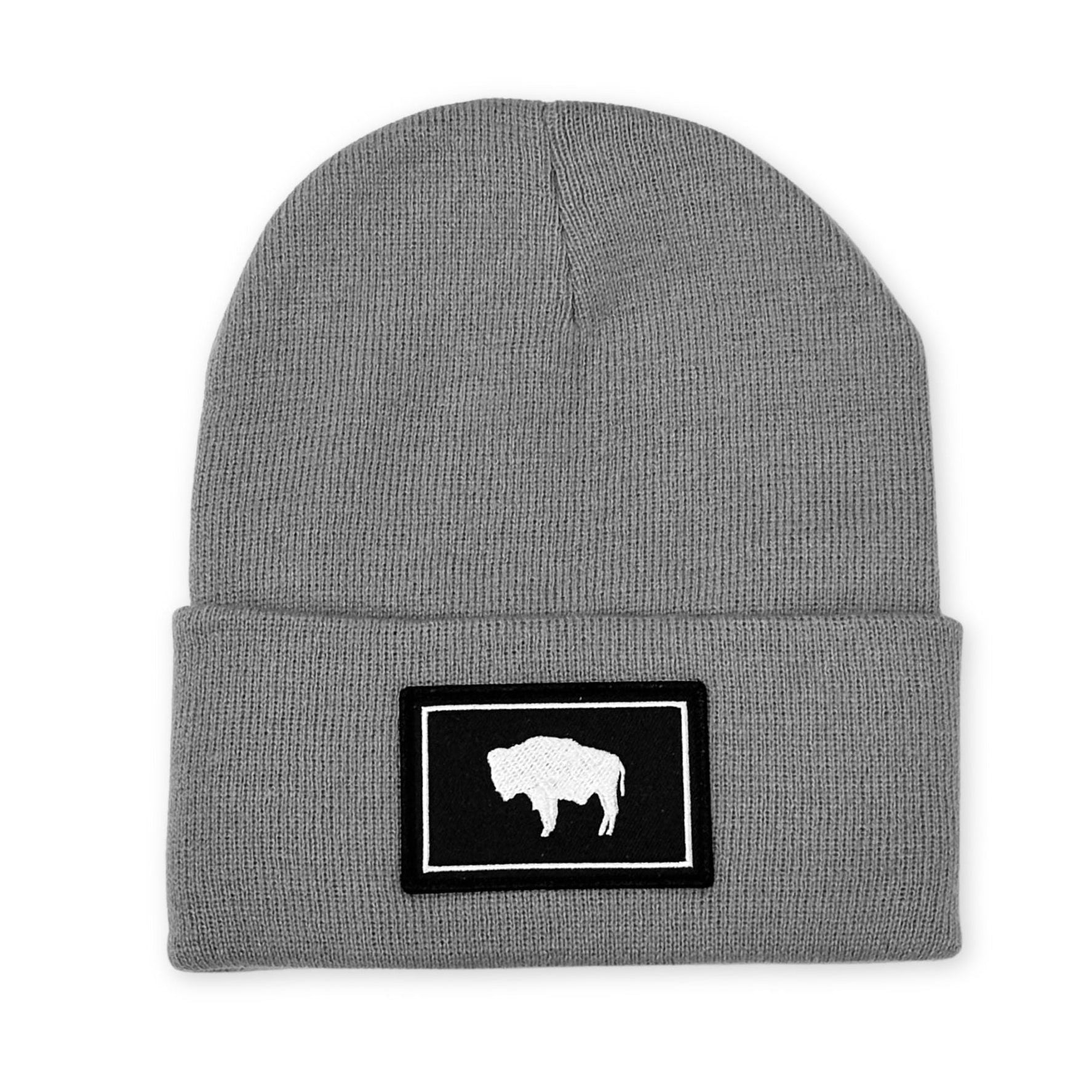 Grey beanie with black and white Wyoming flag patch.