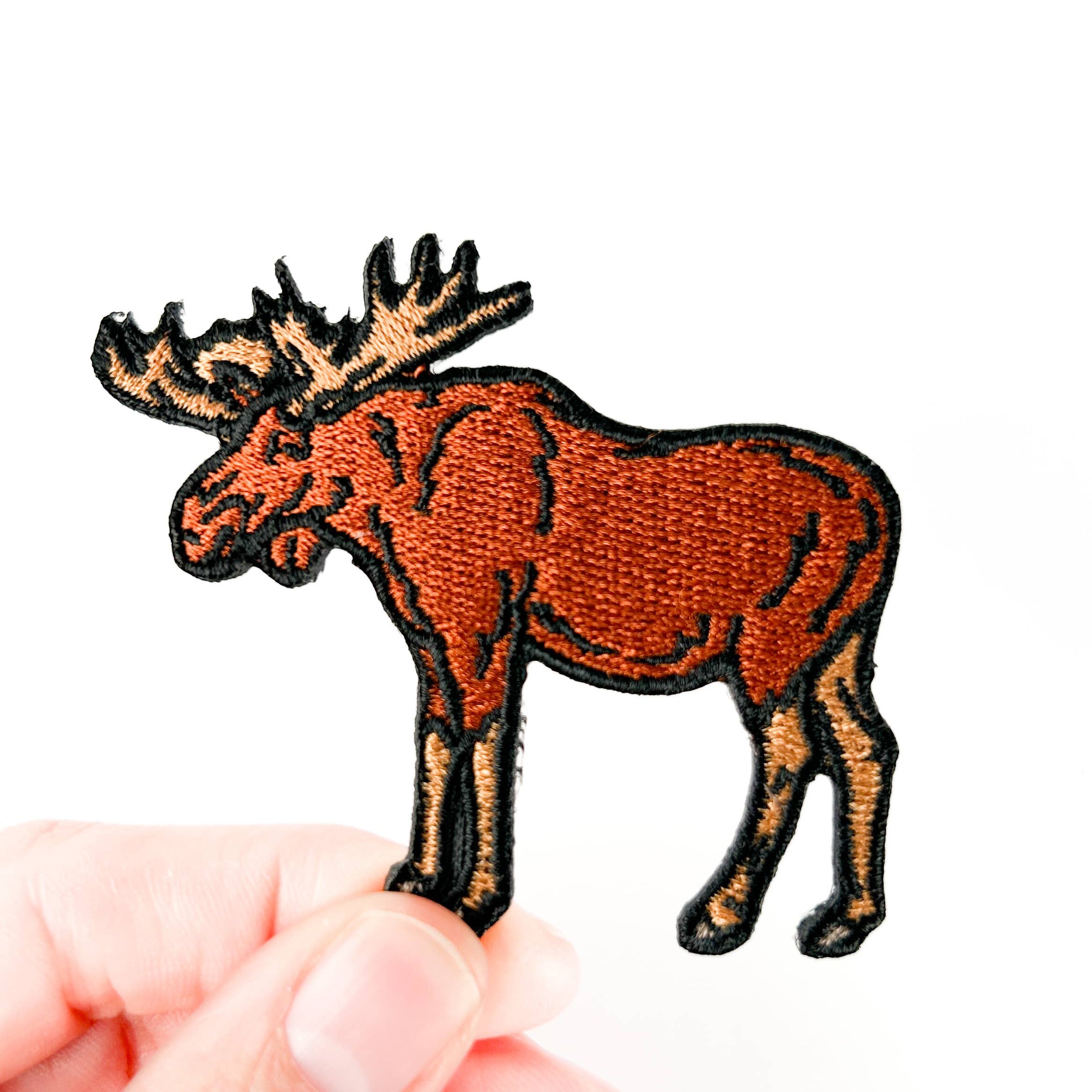 Embroidered moose with Iron On back Patch.