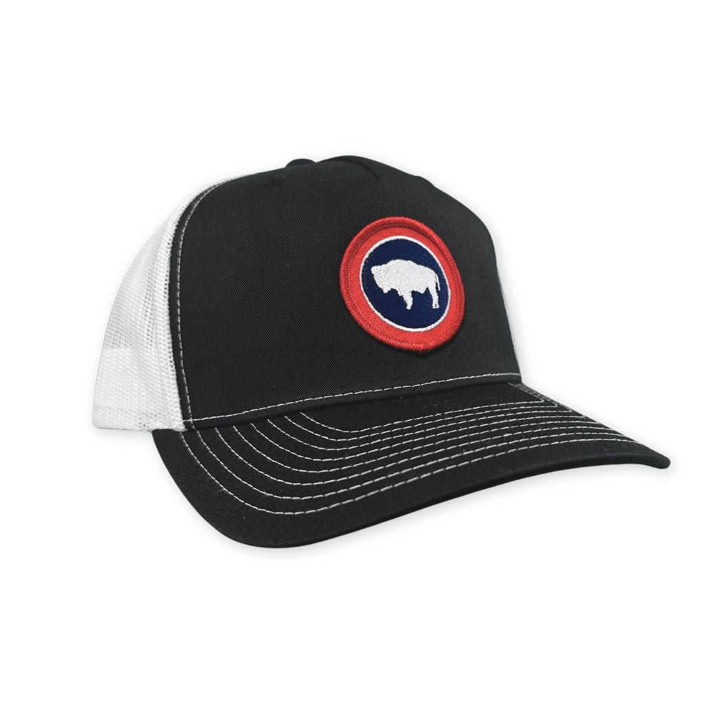 Navy trucker hat with a small round Wyoming Flag patch.