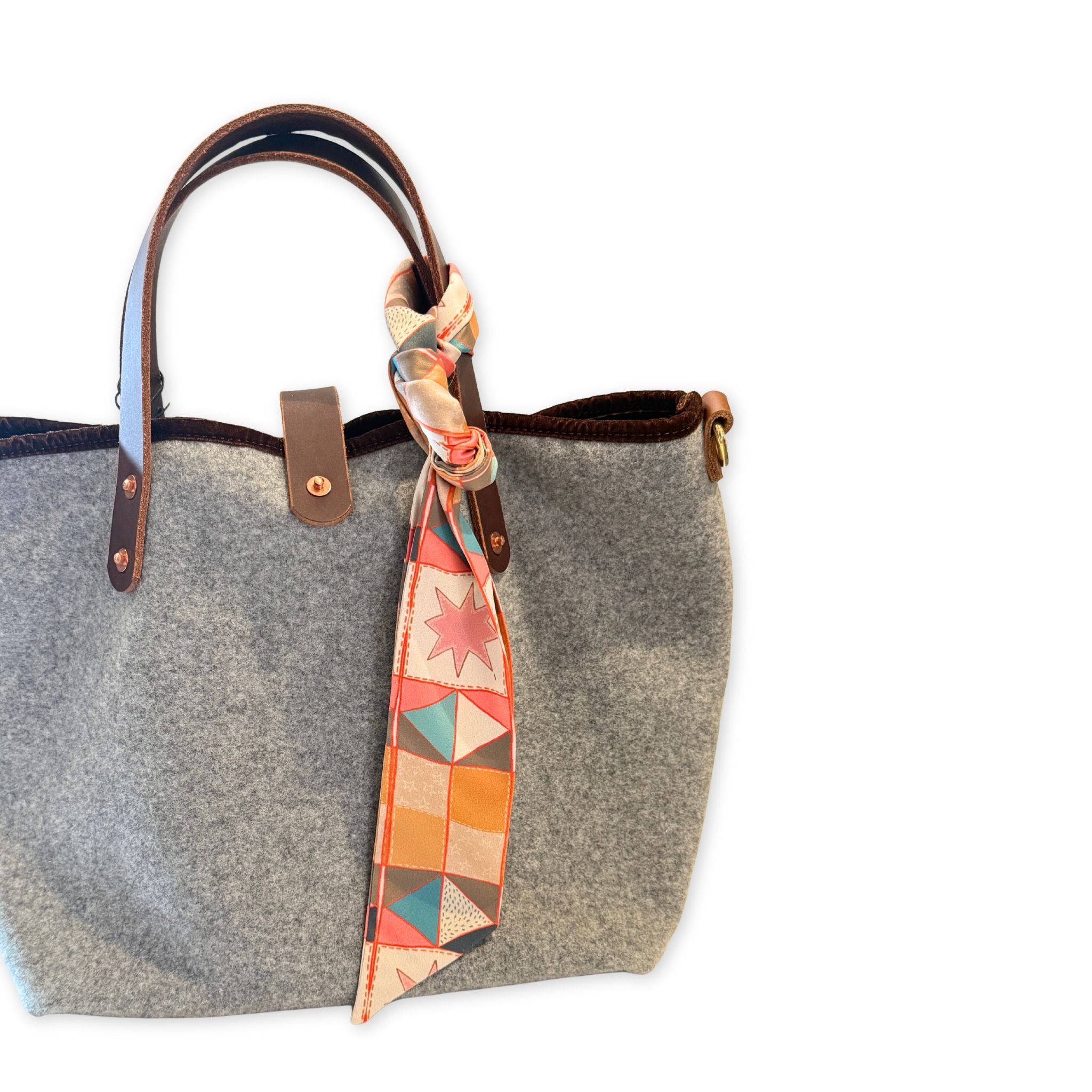Gray tote bag with a colorful patterned Twilly