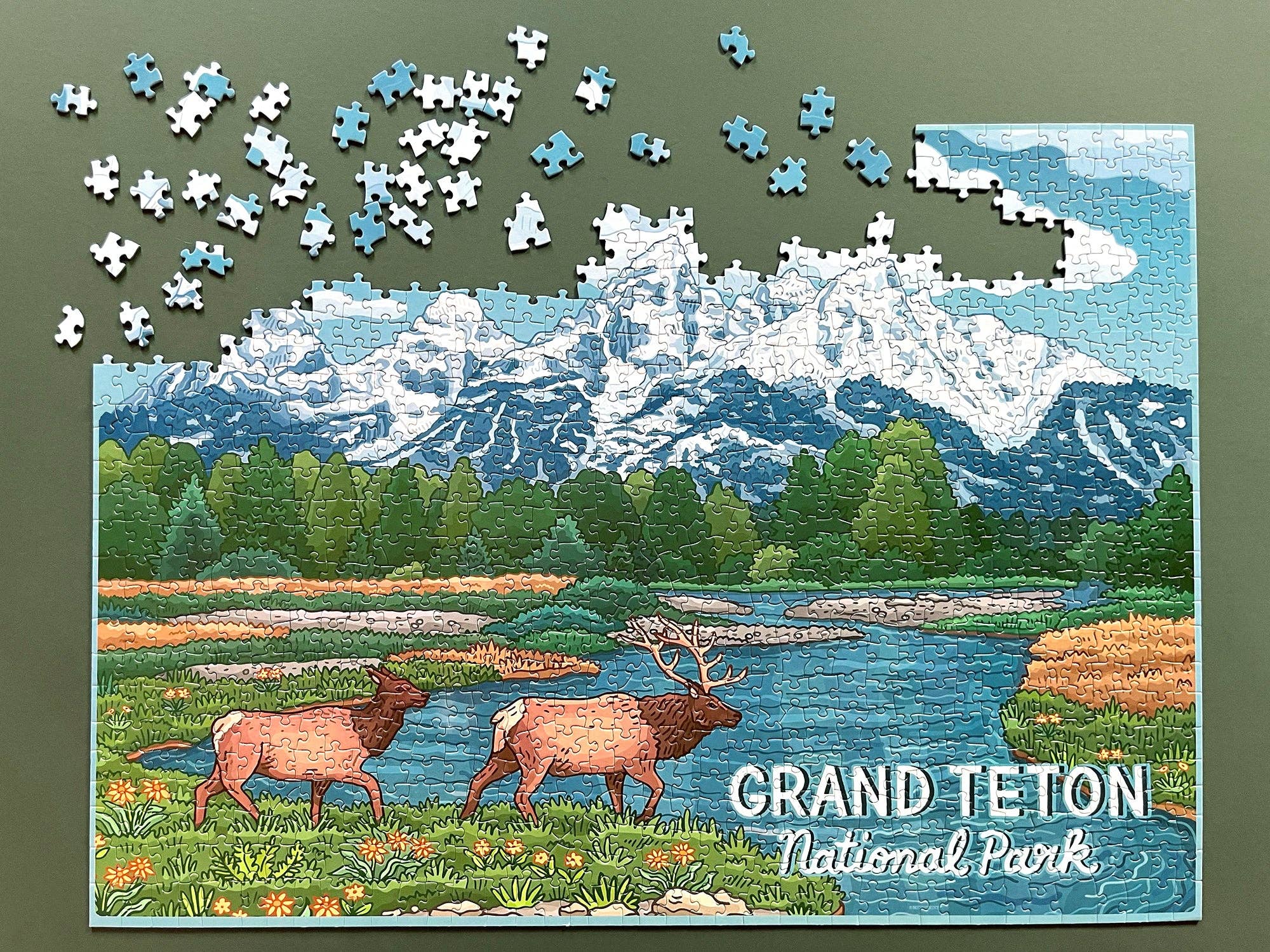Jigsaw puzzle of Grand Teton National Park with completed pieces and missing ones.