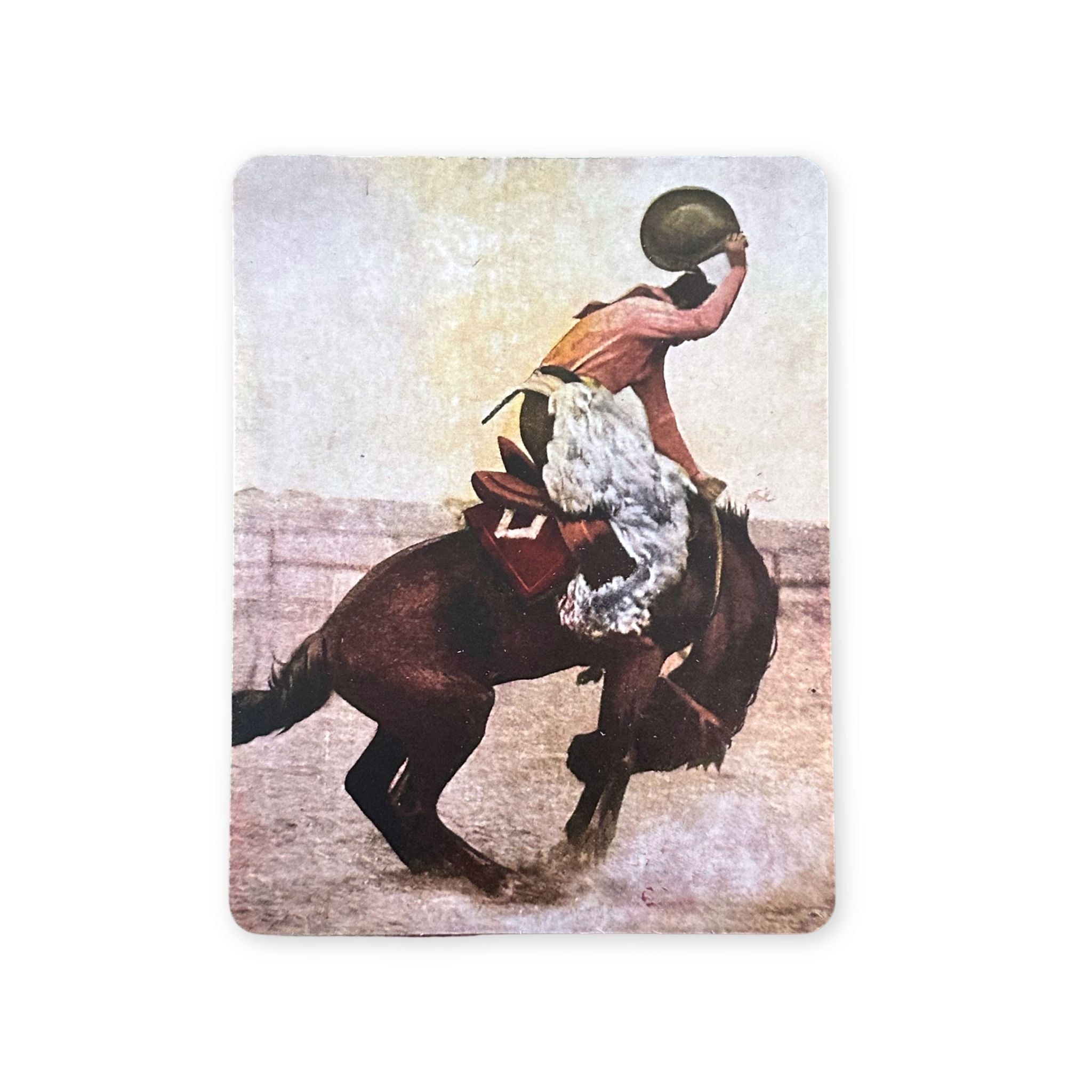 Postcard of a bucking bronco and his cowboy.