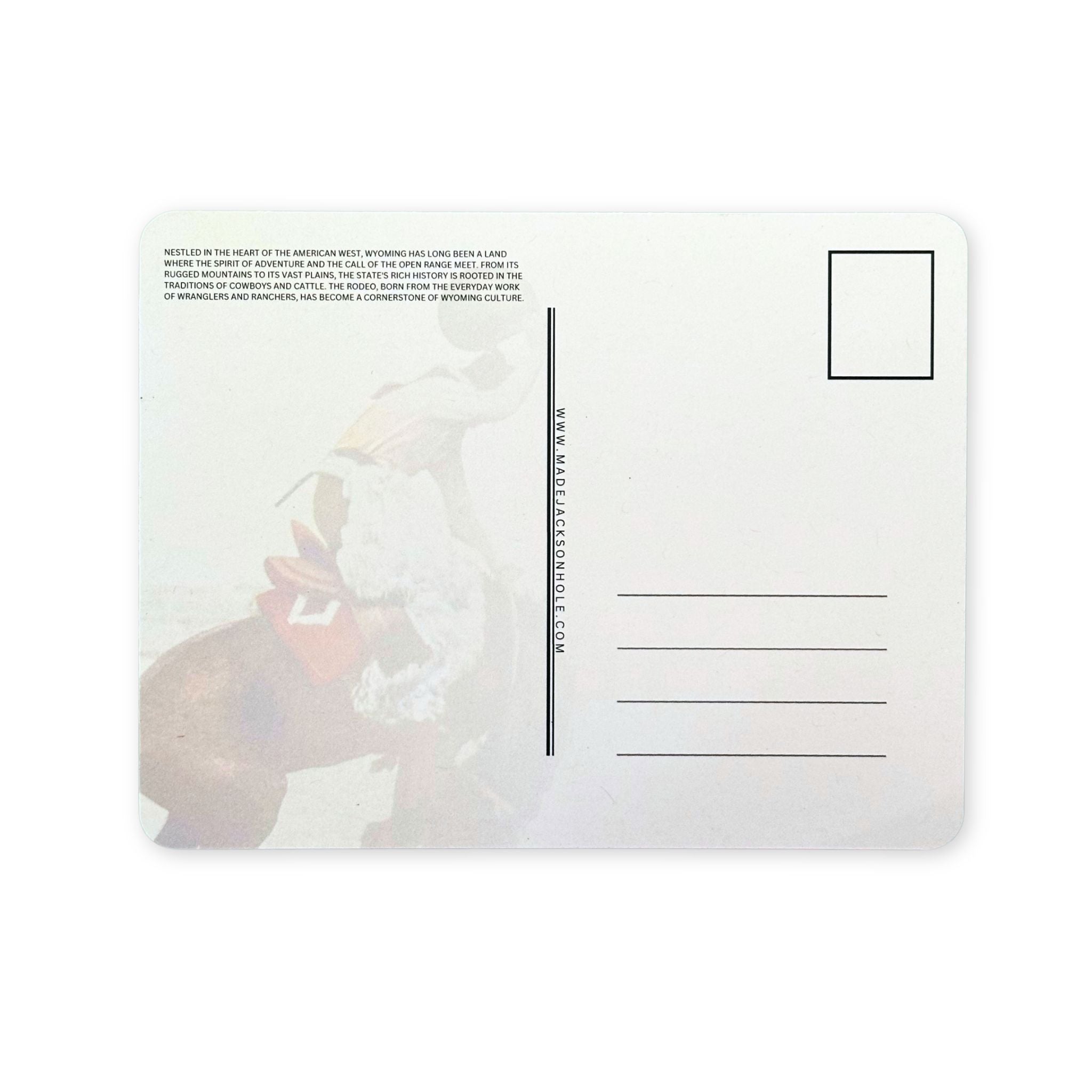 Back of postcard, with faded design of a cowboy and bronco.