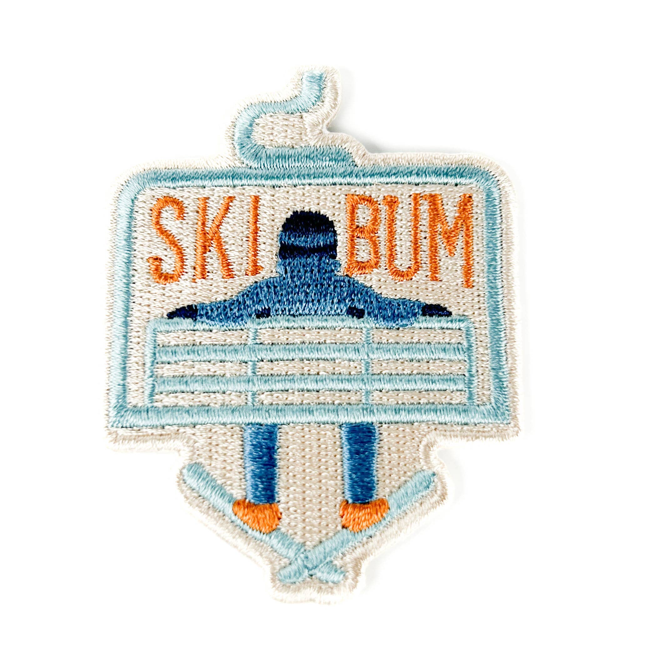 Embroidered iron on patch with 'Ski Bum' text and a skier design.