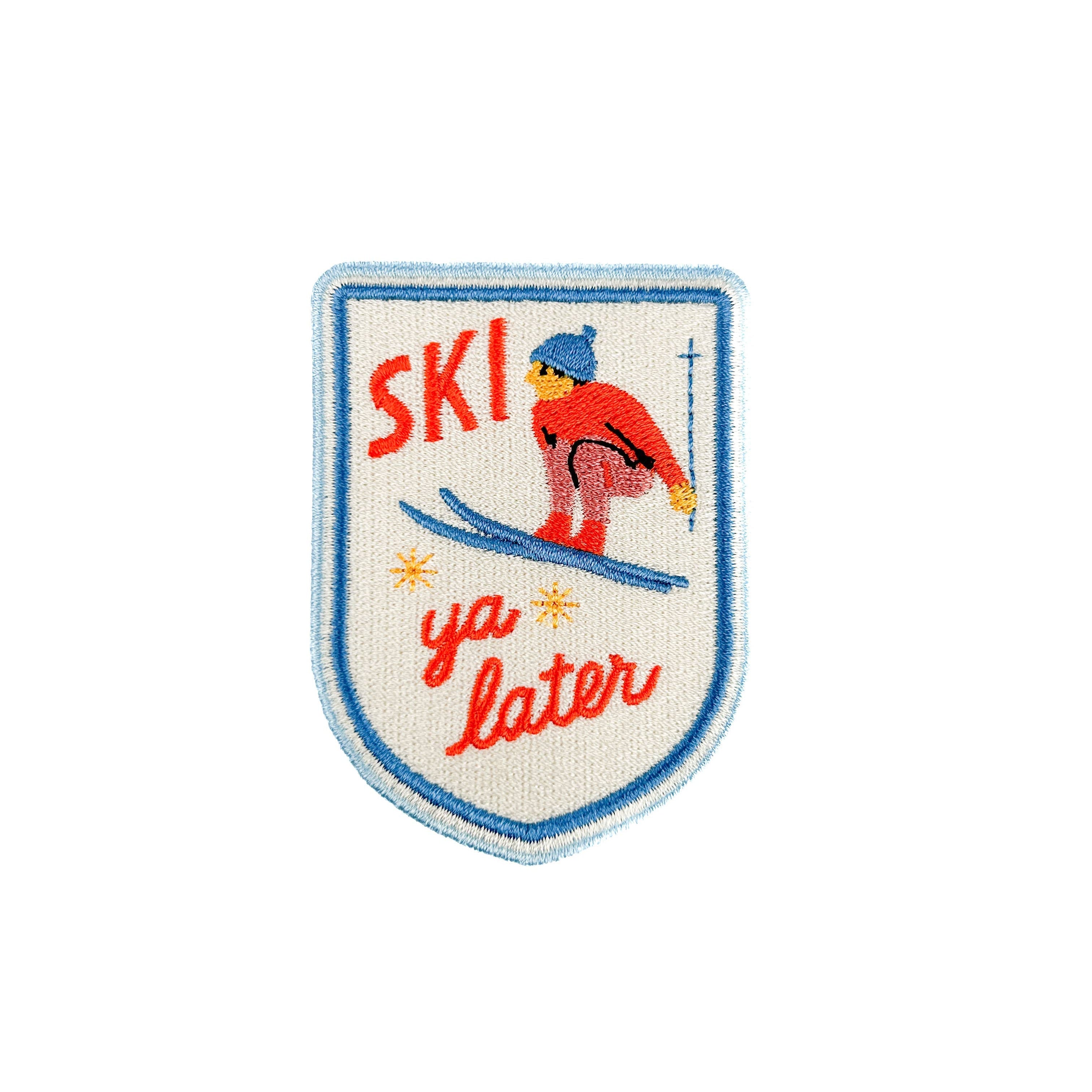Embroidered iron on patch with a skier and 'Ski ya later' text.