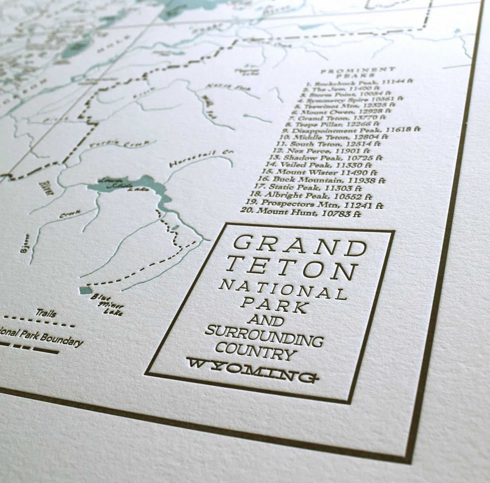 Map of Grand Teton National Park with text detailing the park and surrounding area.