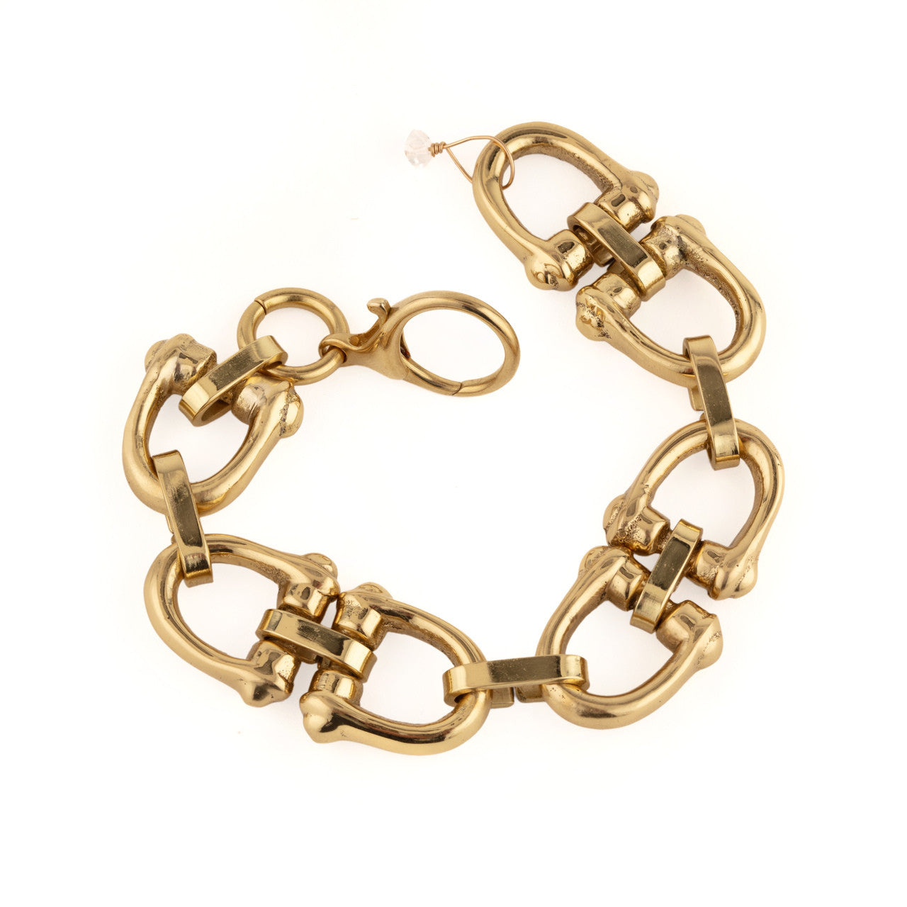 Gold chain bracelet on a white background