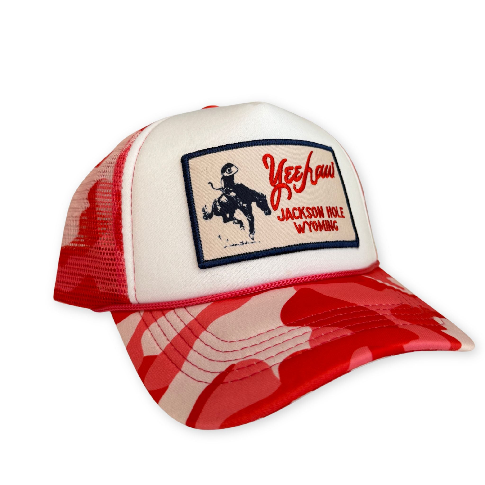 Red Pink and white cap with a patch on a white background