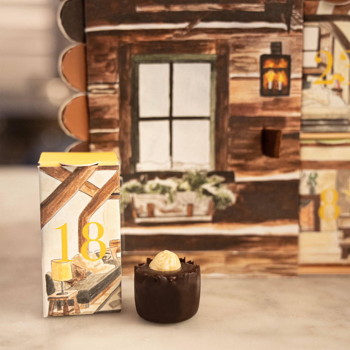 Melt Chocolates Log Cabin Chocolate Advent Calendar, a limited-edition chocolate gift for the Christmas countdown
