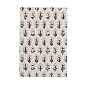 Patterned towel with a black and white design on a white background