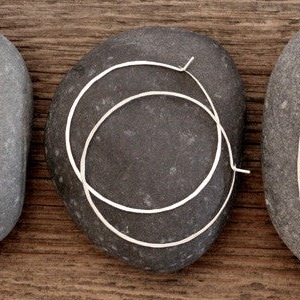 Handmade sterling silver earrings crafted in Wyoming. Each pair is hand hammered.