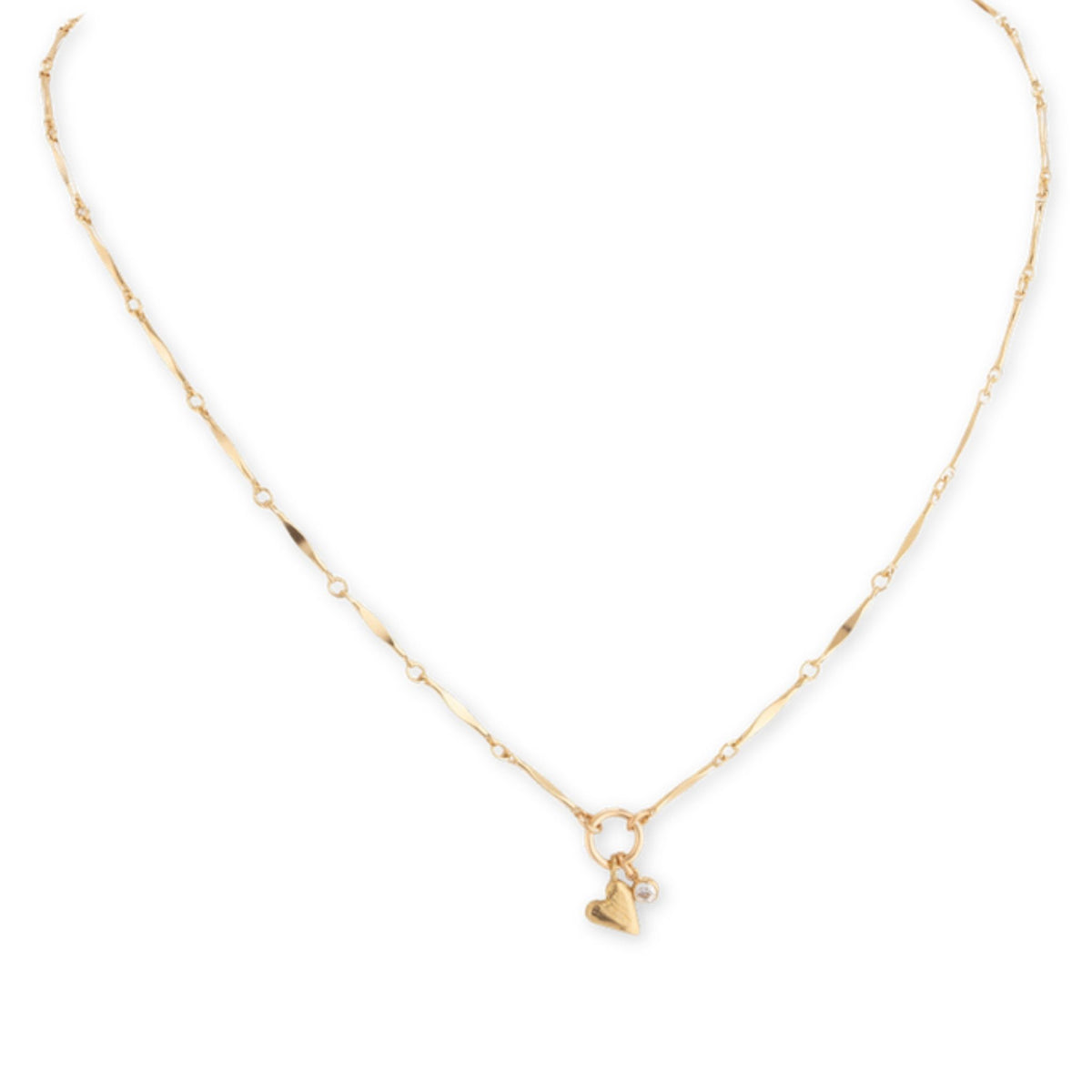 Fine gold bar-link chain necklace with a ring closure, a small gold heart and a tiny pearl charm on white