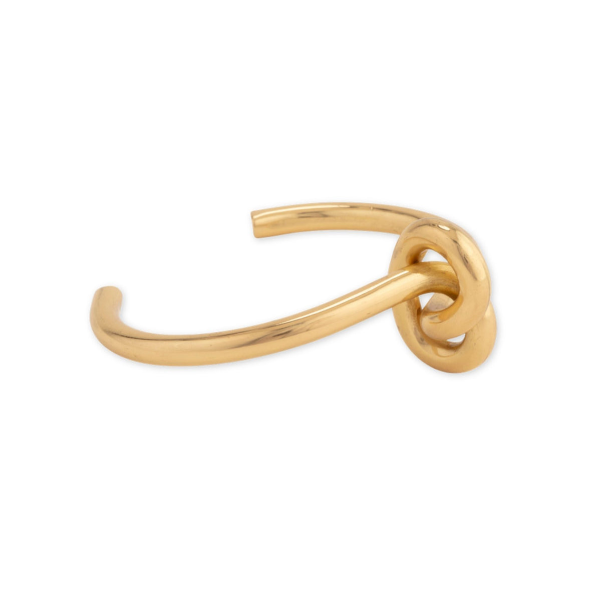 Brass Knot Cuff bracelet by Taylor & Tessier, a thin solid brass stacking cuff tied in a loose knot at one side