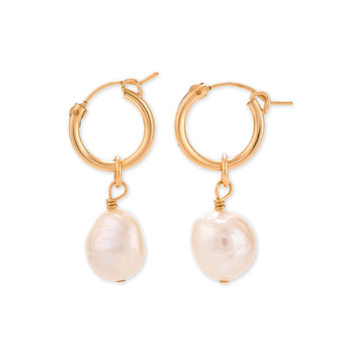 Gold hoop earrings each with a hanging baroque freshwater pearl, shown as a pair on a white background