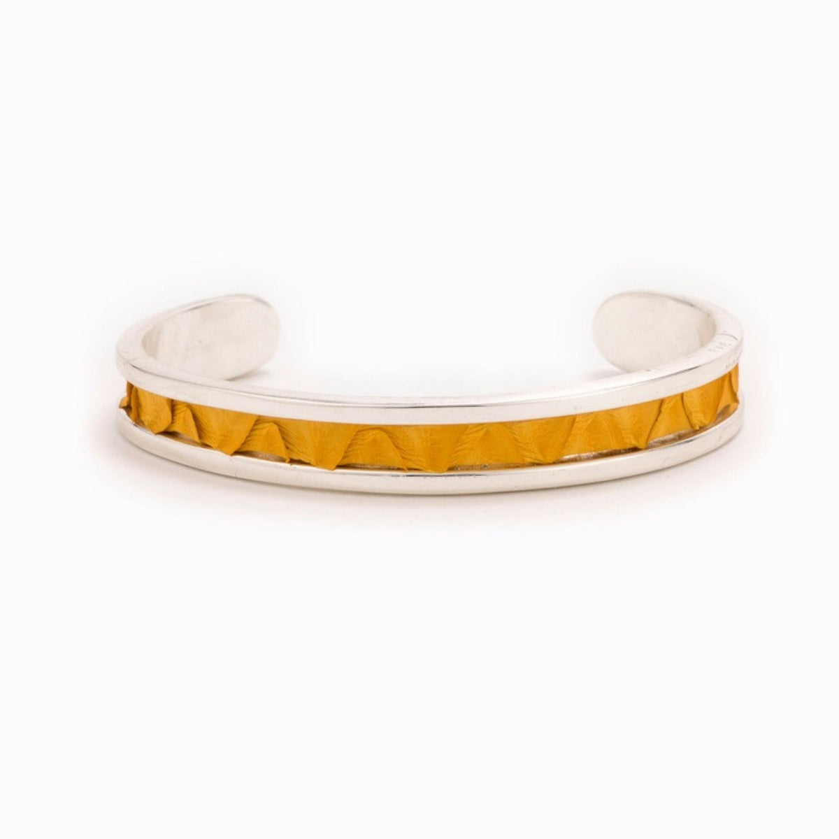 Small Taylor & Tessier cuff bracelet, .5in wide, front view, mustard yellow python-embossed leather on a silver band