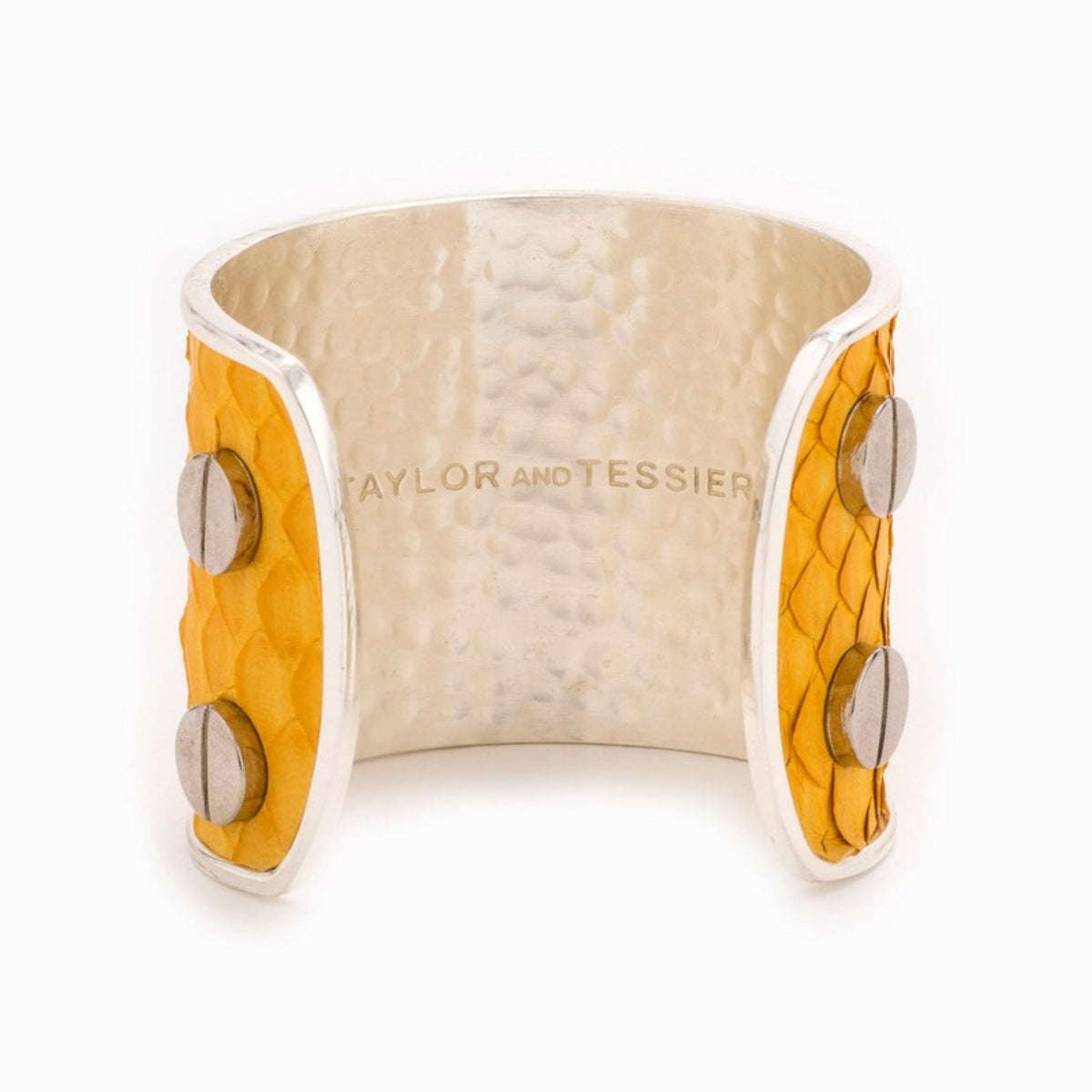 Large Taylor & Tessier cuff bracelet, inside view, mustard yellow python-embossed leather on a silver band