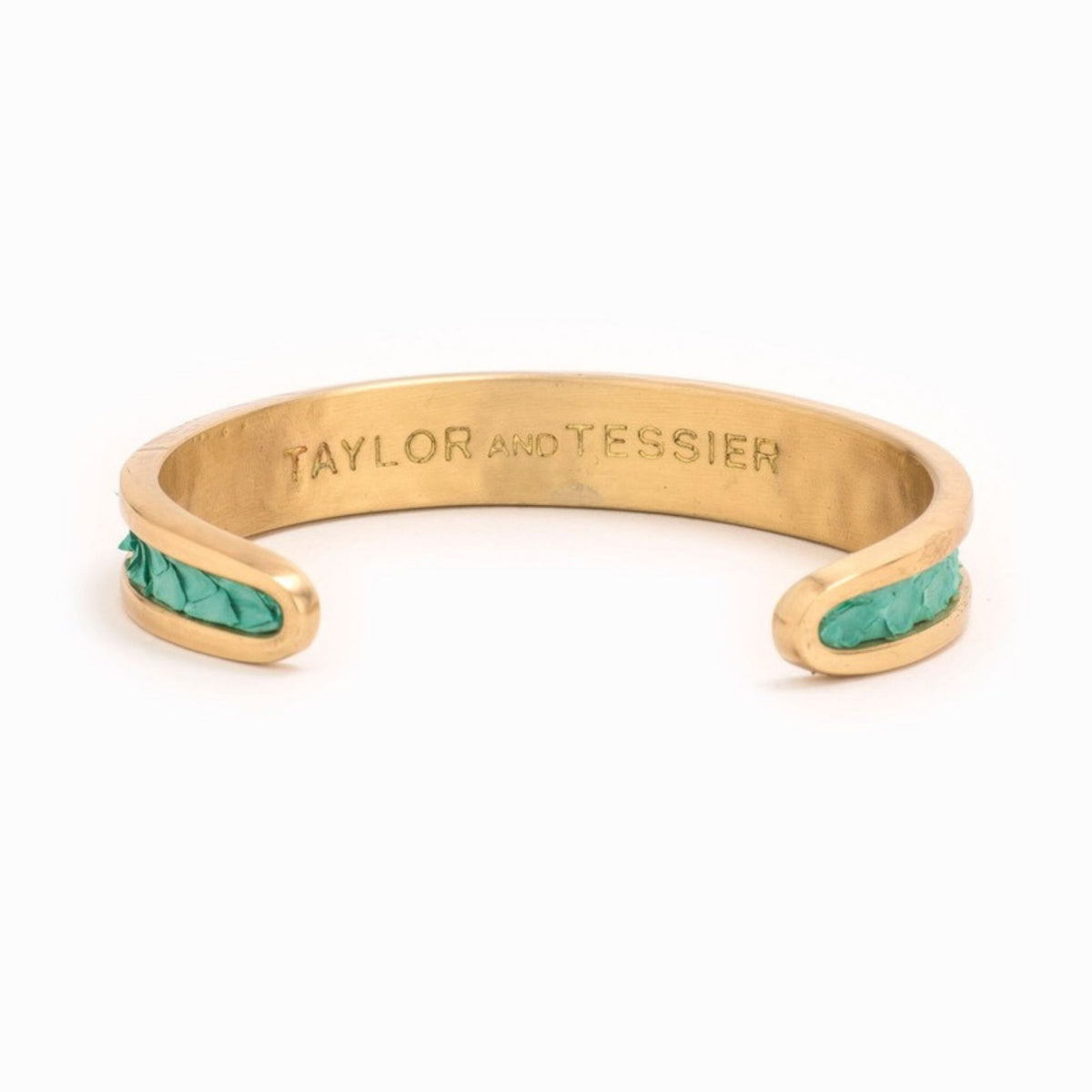 Small Taylor & Tessier cuff bracelet, .5in wide, inside view, turquoise python-embossed leather on a gold band