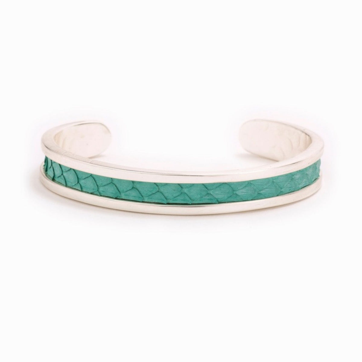 Small Taylor & Tessier cuff bracelet, .5in wide, front view, turquoise python-embossed leather on a silver band