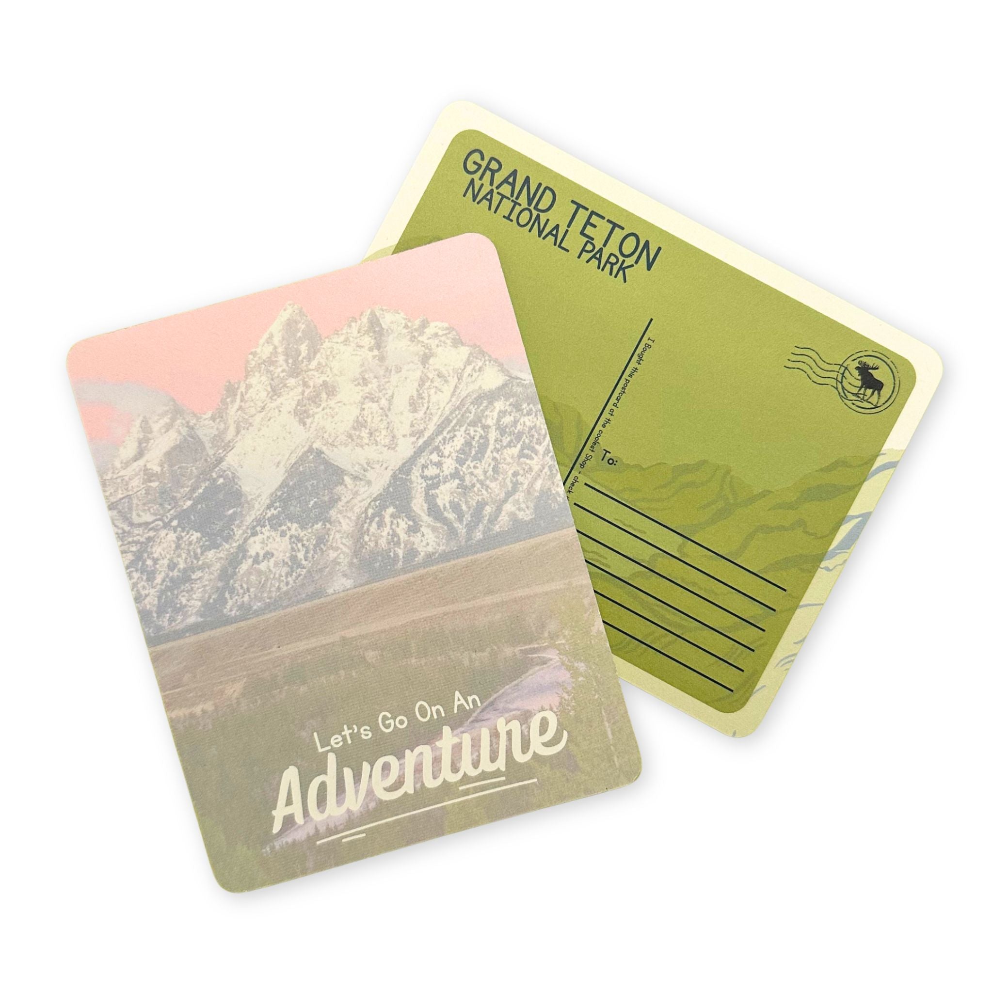 Postcard showing the front and back. Front is a faded image of the teton range, that says Let's go on an adventure. 
