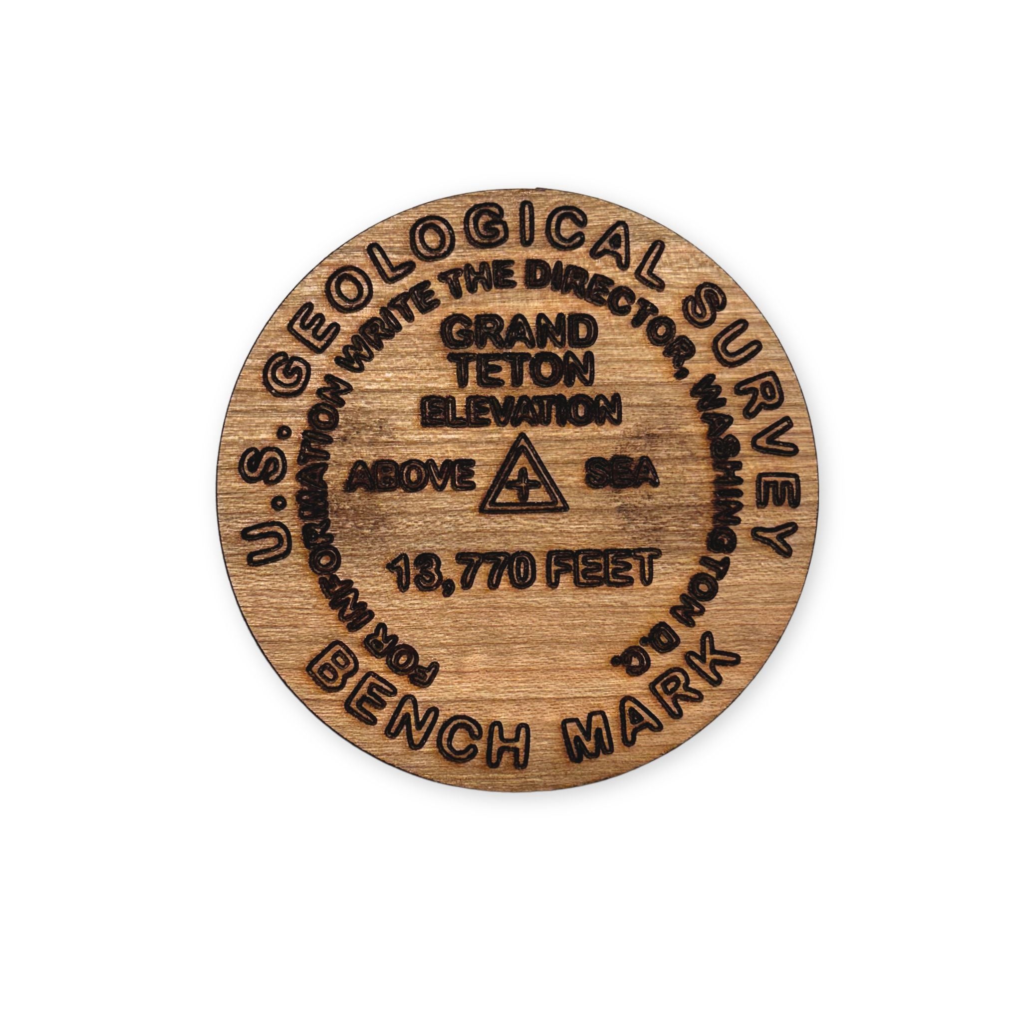 Wooden benchmark marker with U.S. Geological Survey text on a white background