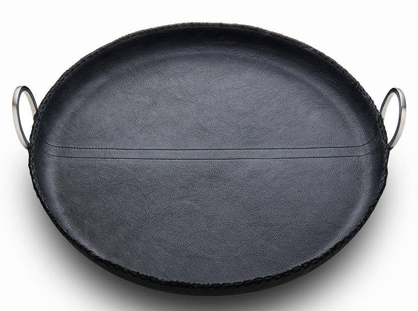 Black oval tray with handles on a white background