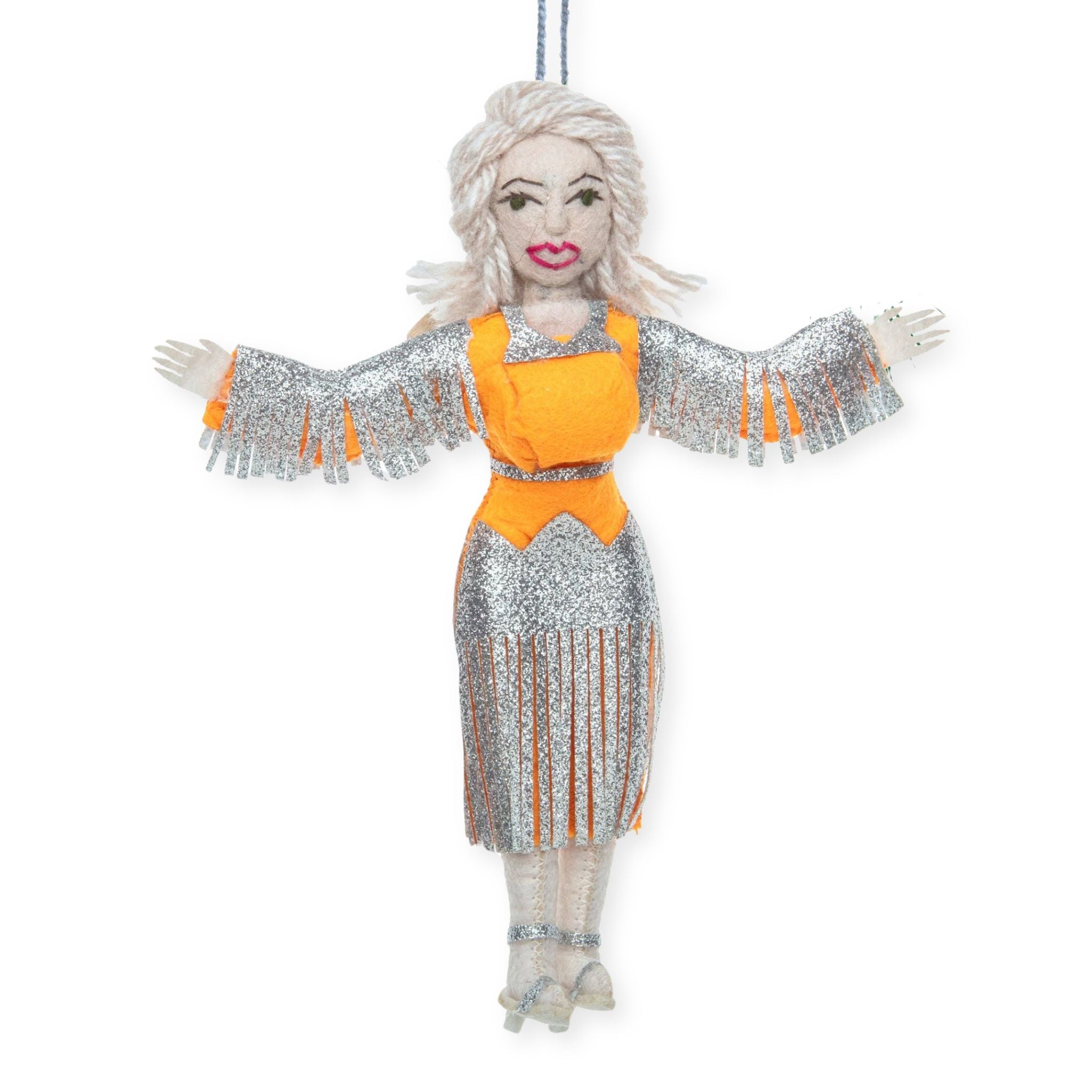 A hanging fabric doll ornament featuring a woman in a glittery silver fringe costume with a bright orange top, white hair, and pale skin, shown against a plain white background.