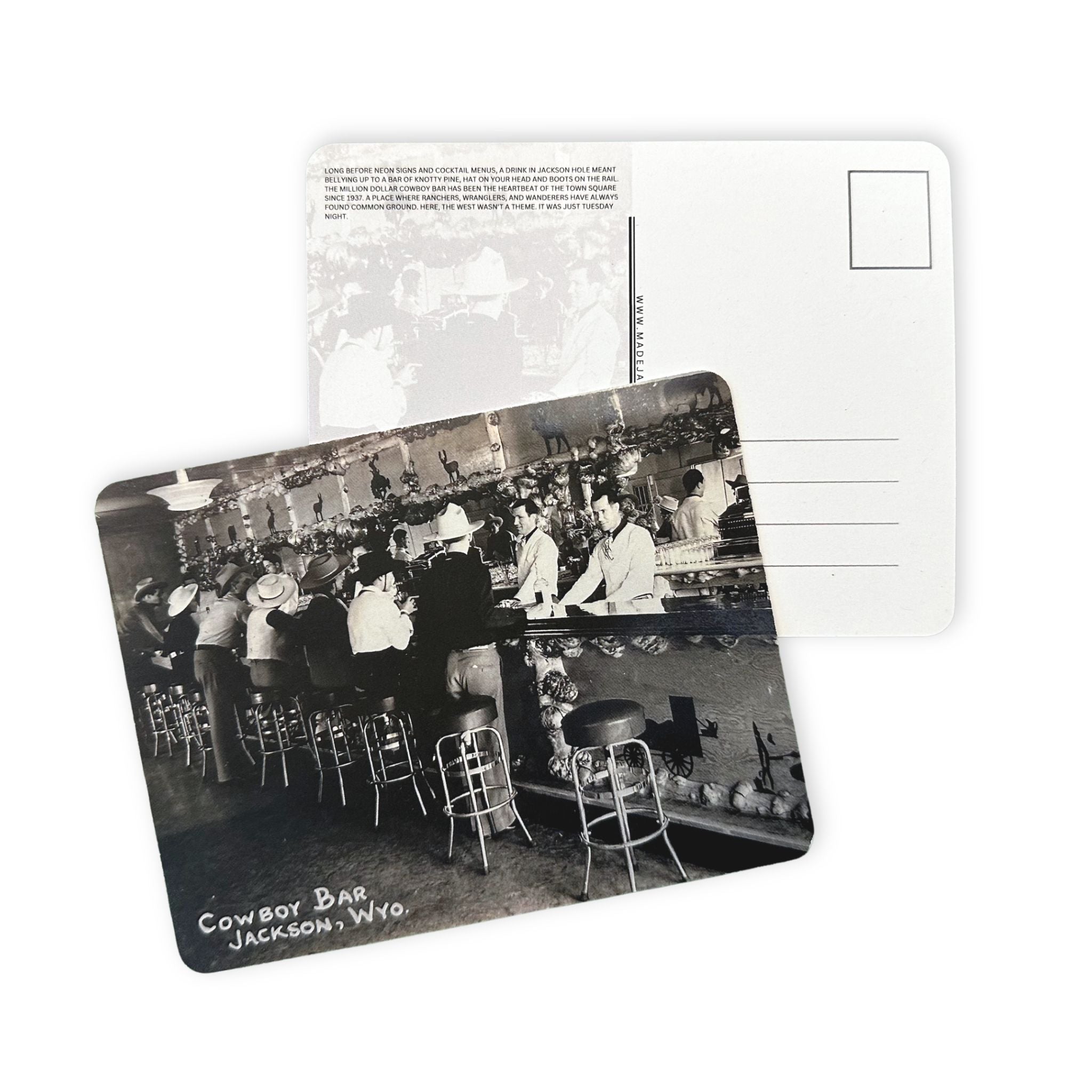 Vintage-style postcard of a cowboy bar in Jackson, Wyoming with black and white photo and text.