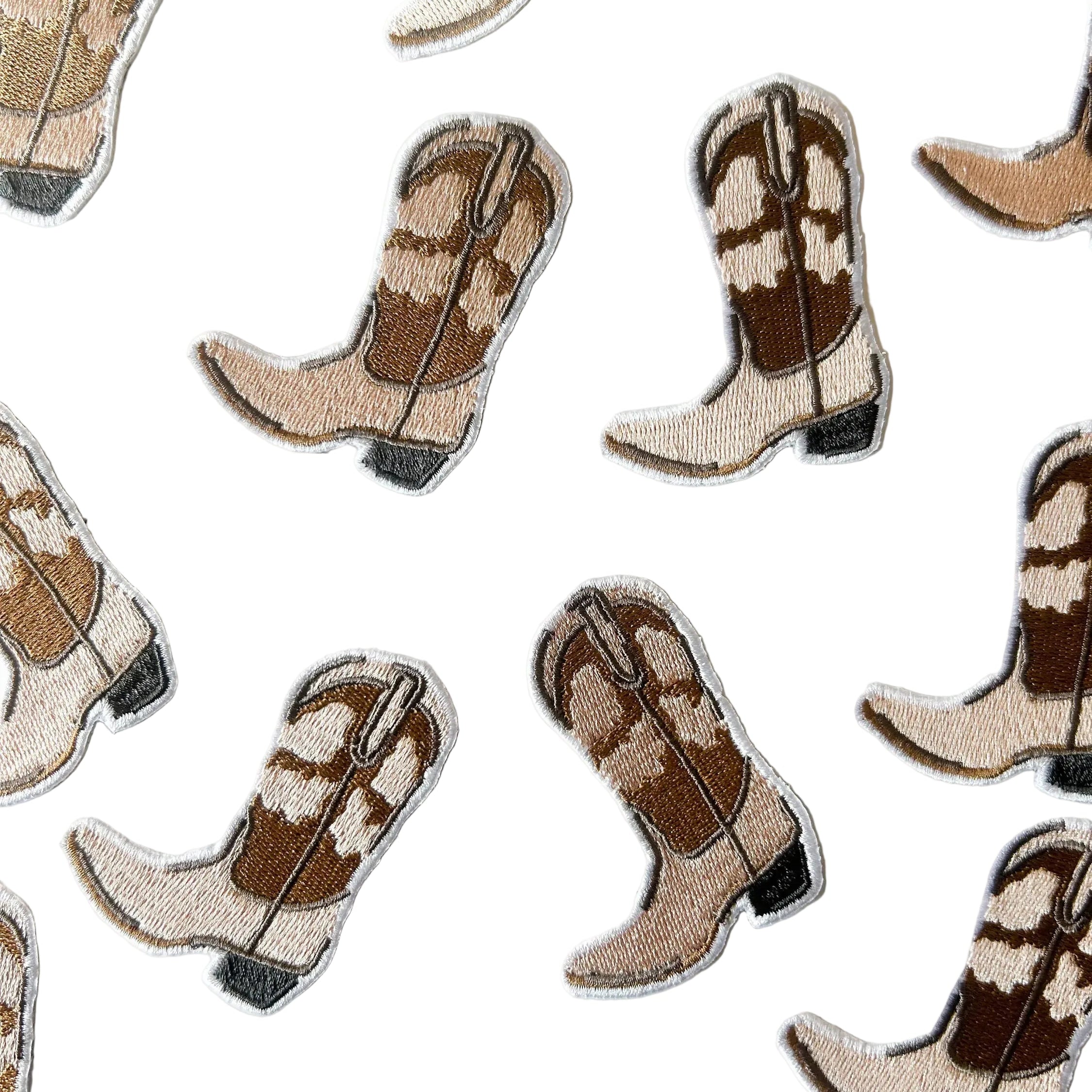 Embroidered iron on patch of a brown and tan cowgirl boot. 