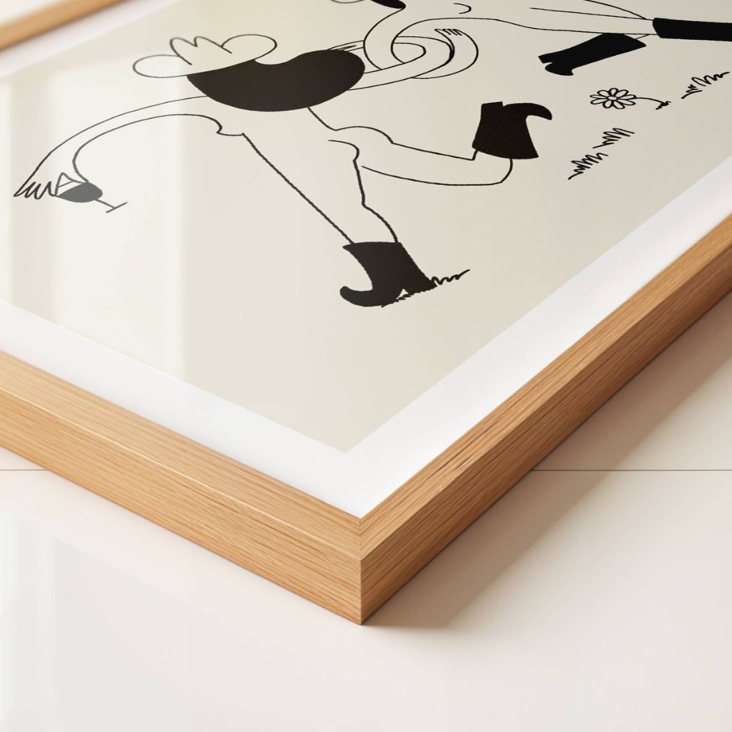 Framed black and white abstract artwork on a light background