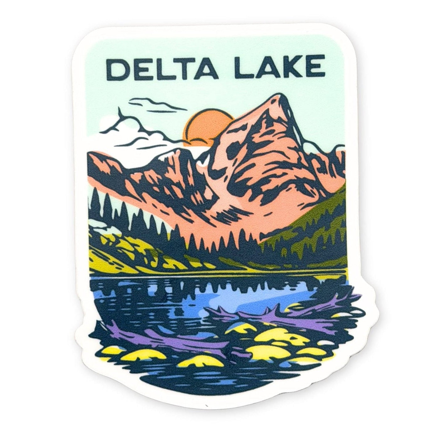 Sticker with a mountain and lake design labeled 'Delta Lake' on a light blue background.