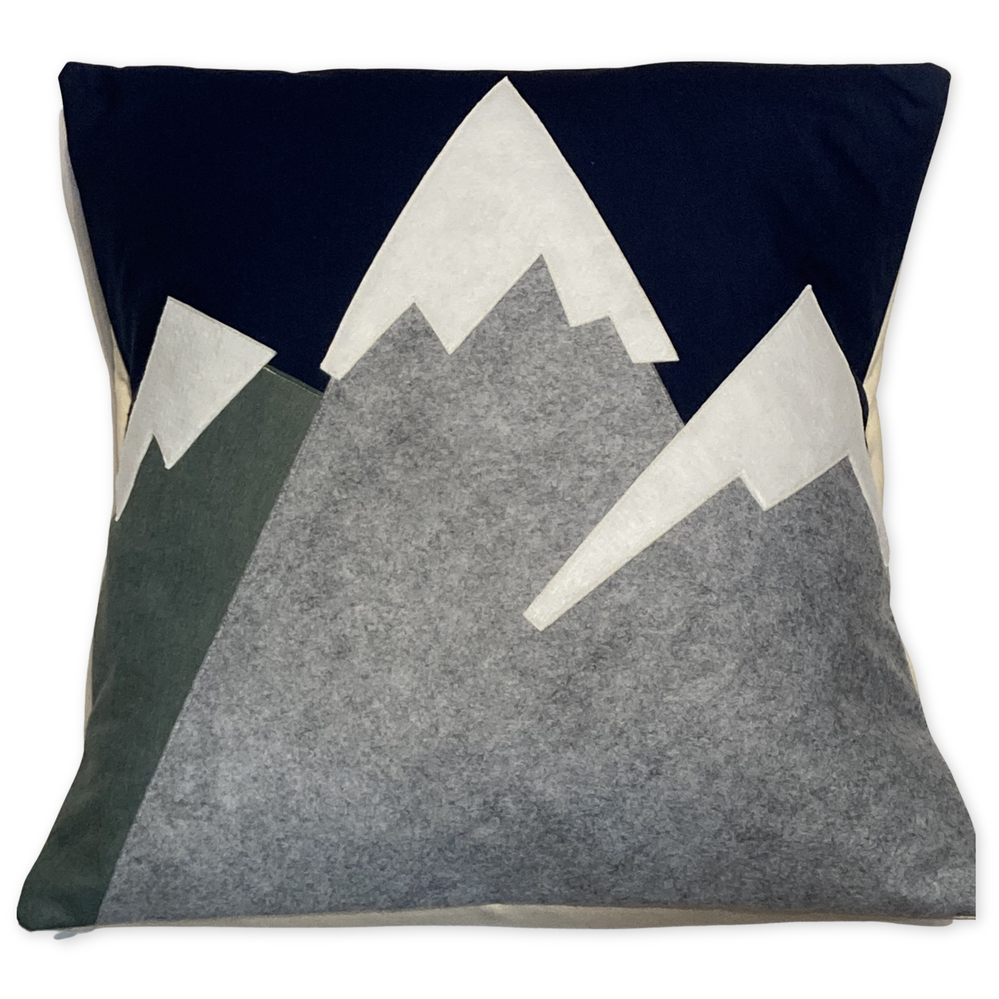 wool pillow with a felt snow capped mountain range design