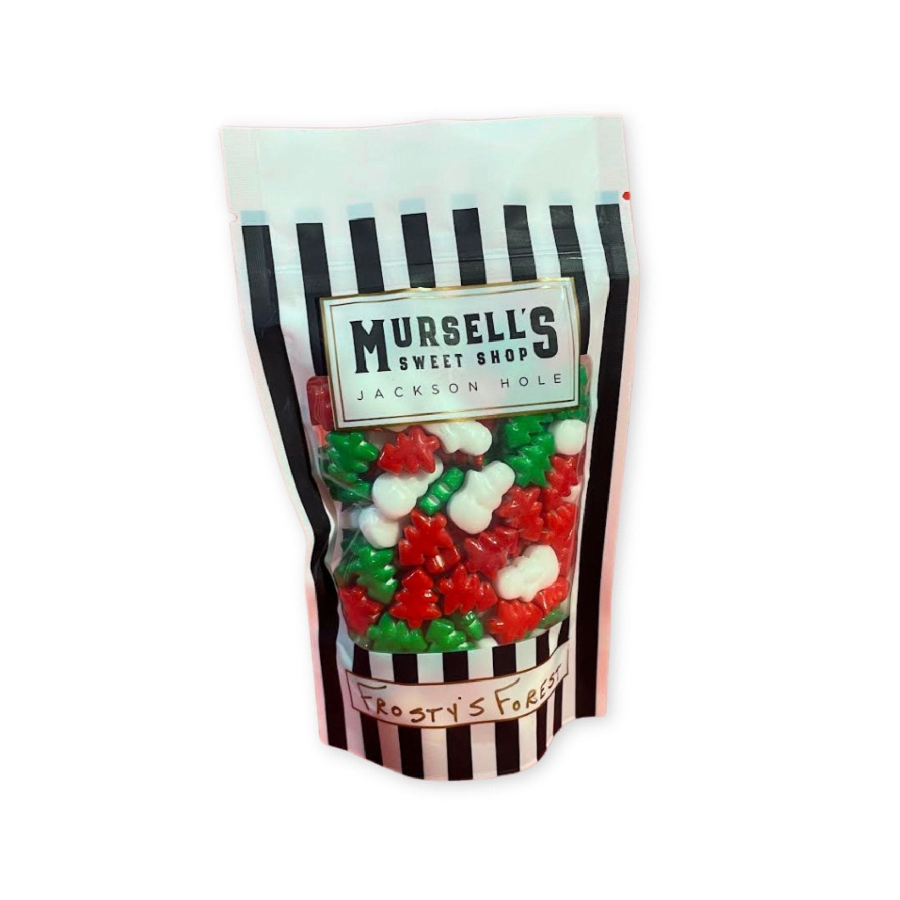 Black and White Packaging with red, white, and green gummies shaped like snowmen and trees 