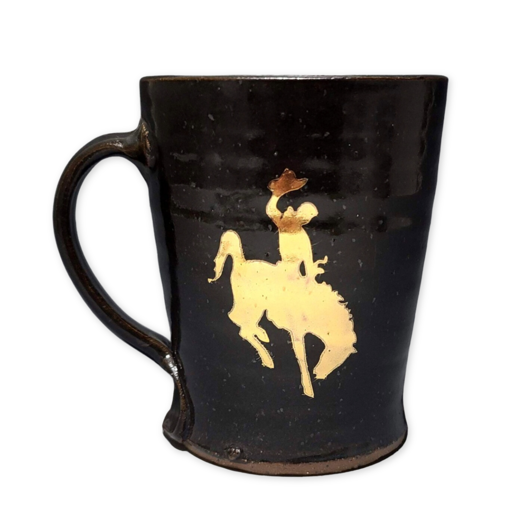 black ceramic mug with a gold wyoming cowboy design