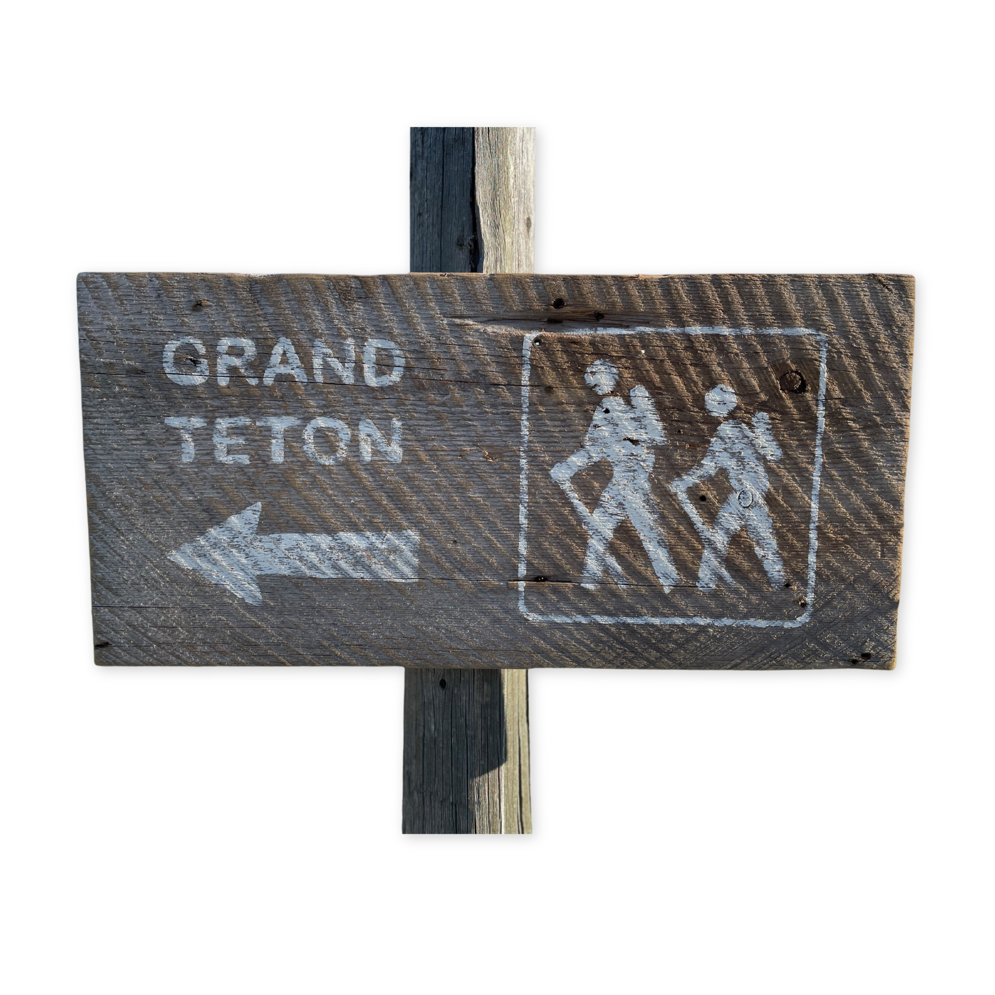 rustic barnwood style sign pointing to grand teton national park