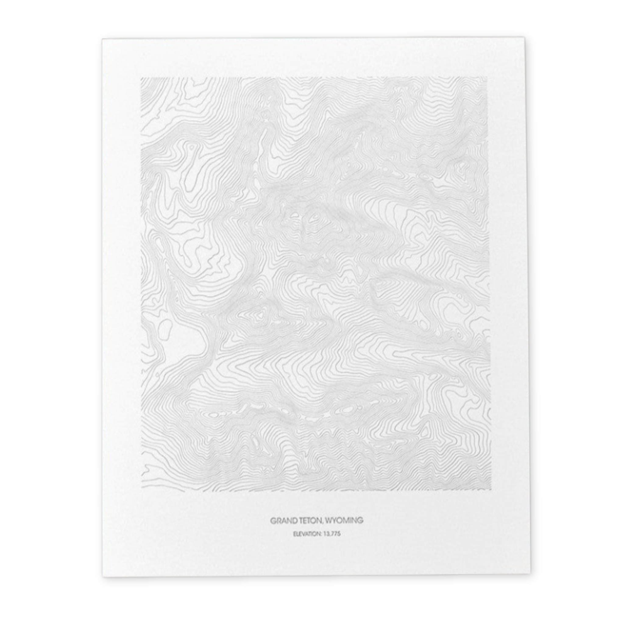 topographic print of the teton mountain range centered around the grand teton