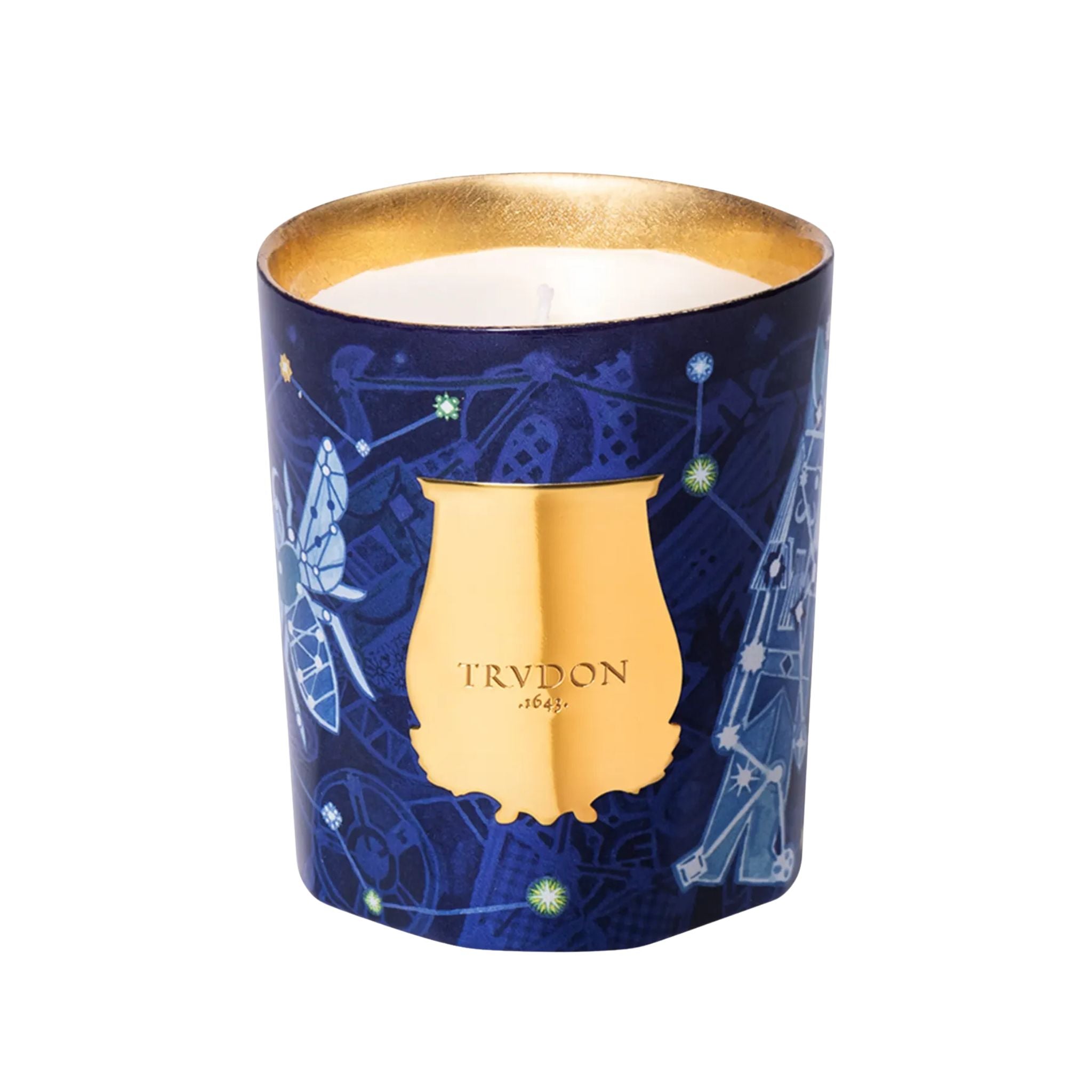 Trudon candle with blue and gold design on a white background